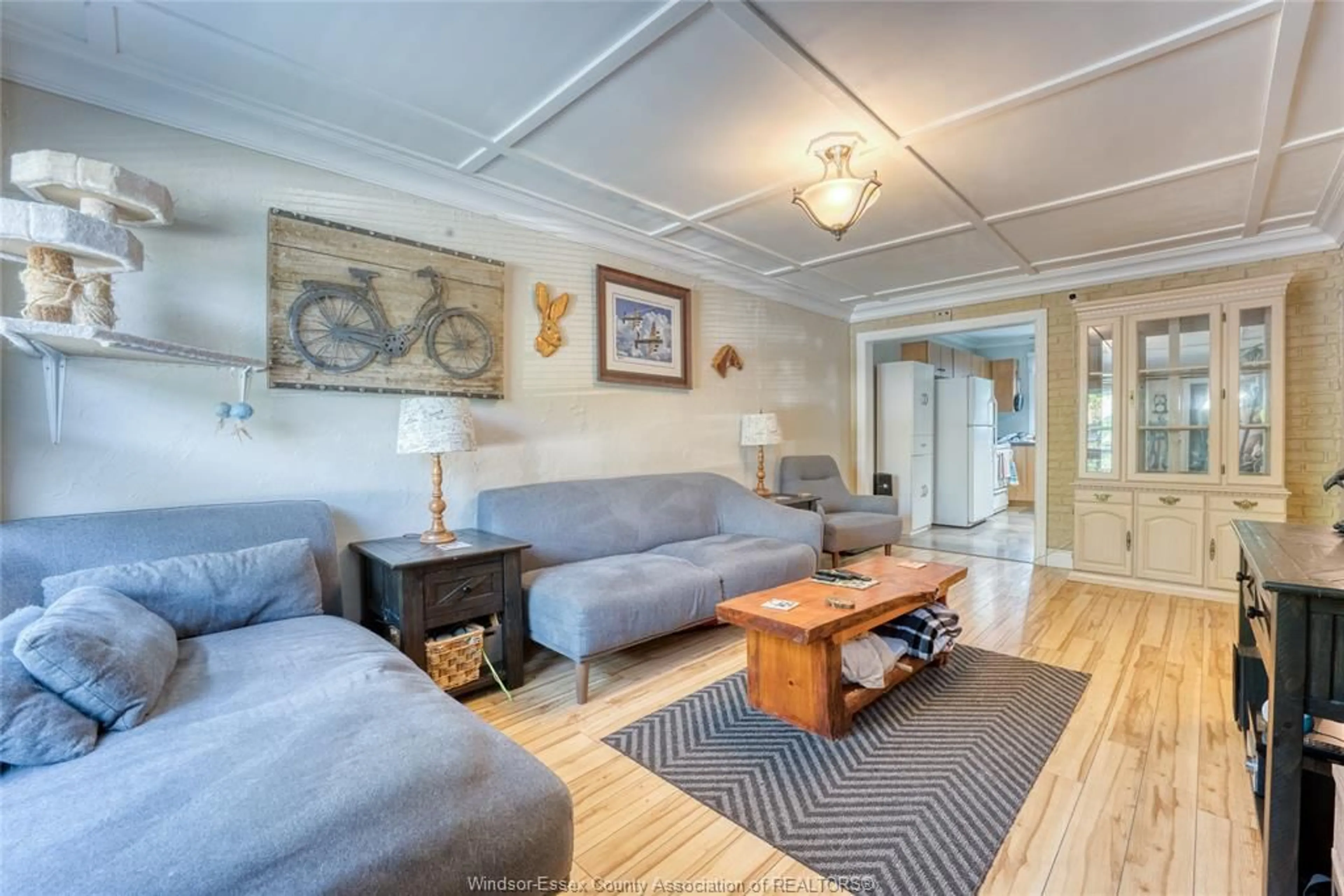 Living room with furniture, wood/laminate floor for 2009 BUCKINGHAM, Windsor Ontario N8T 2B2