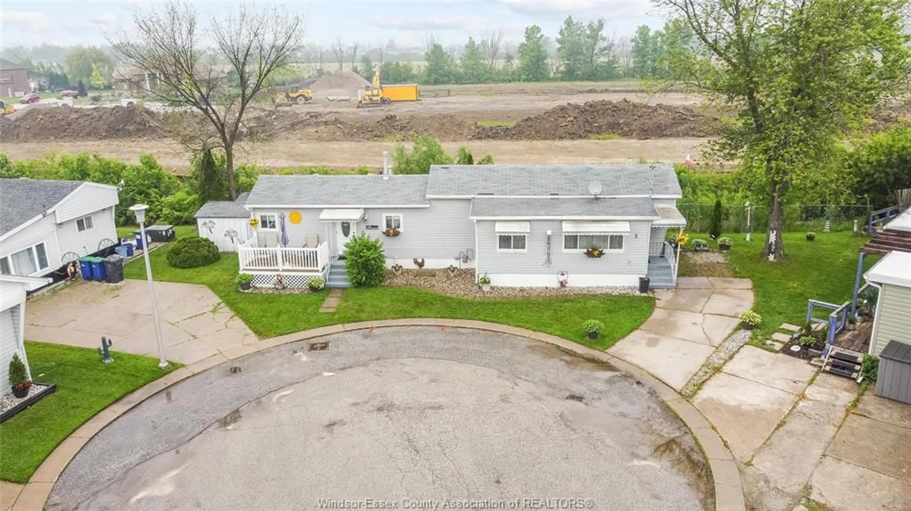 A pic from outside/outdoor area/front of a property/back of a property/a pic from drone, building for 5 ELM Crt, McGregor Ontario N0R 1J0