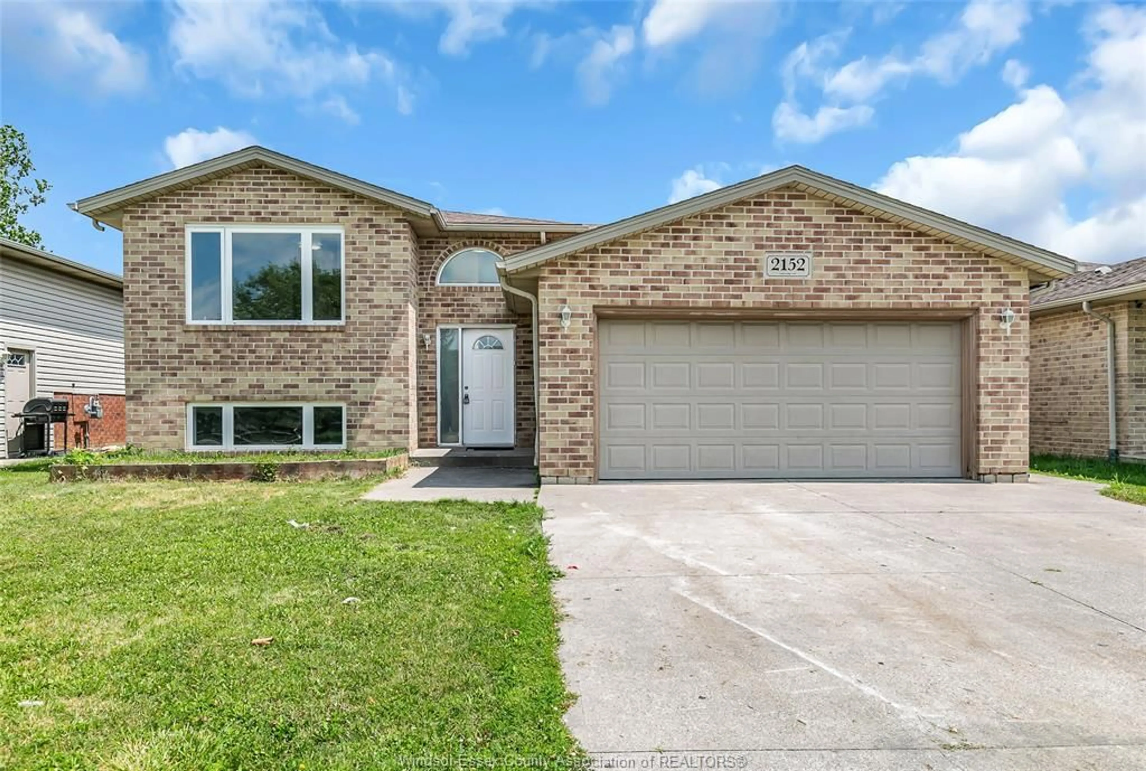 Home with brick exterior material, street for 2152 CURRY, Windsor Ontario N9B 3X4