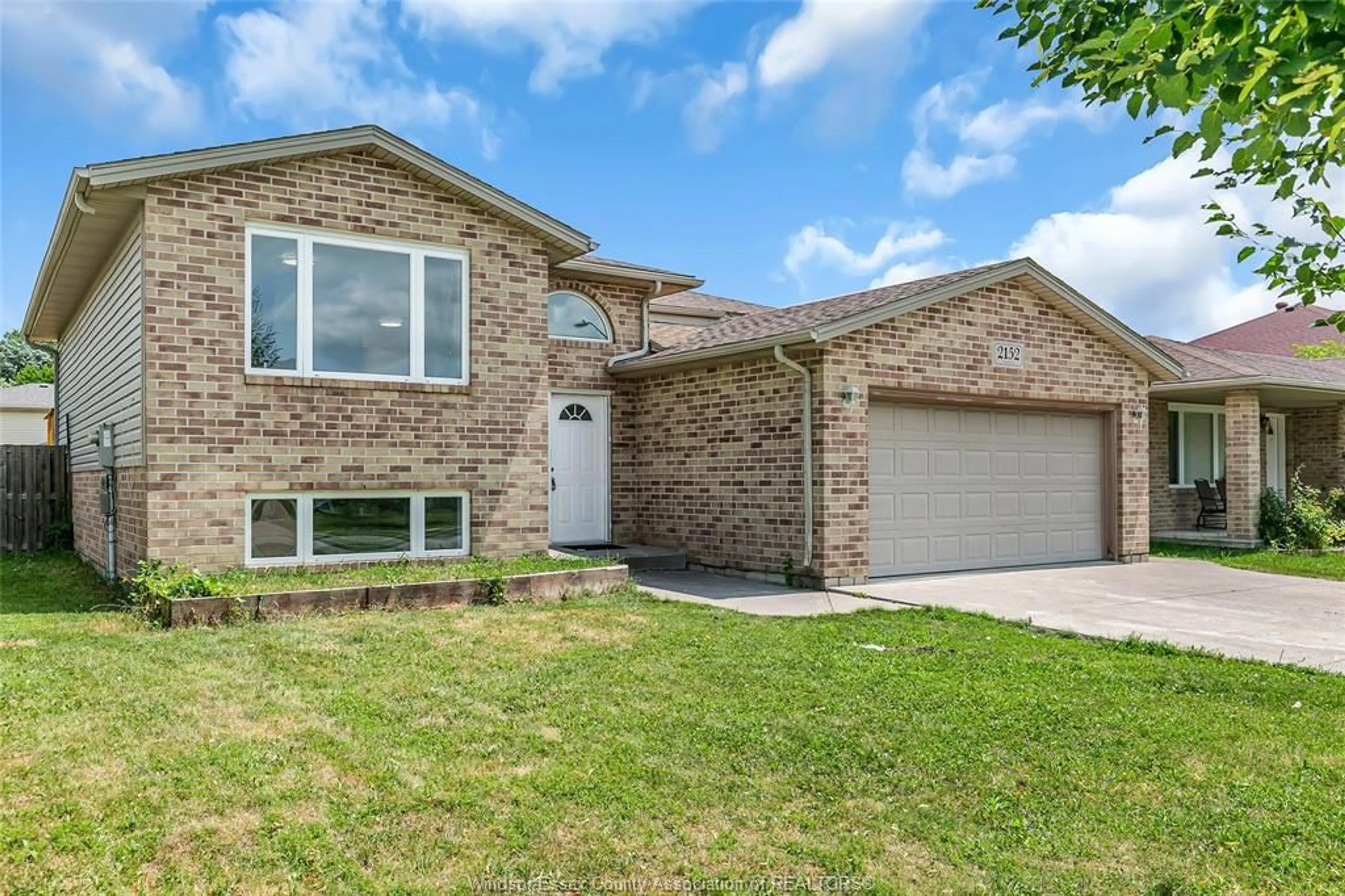 Home with brick exterior material, street for 2152 CURRY, Windsor Ontario N9B 3X4