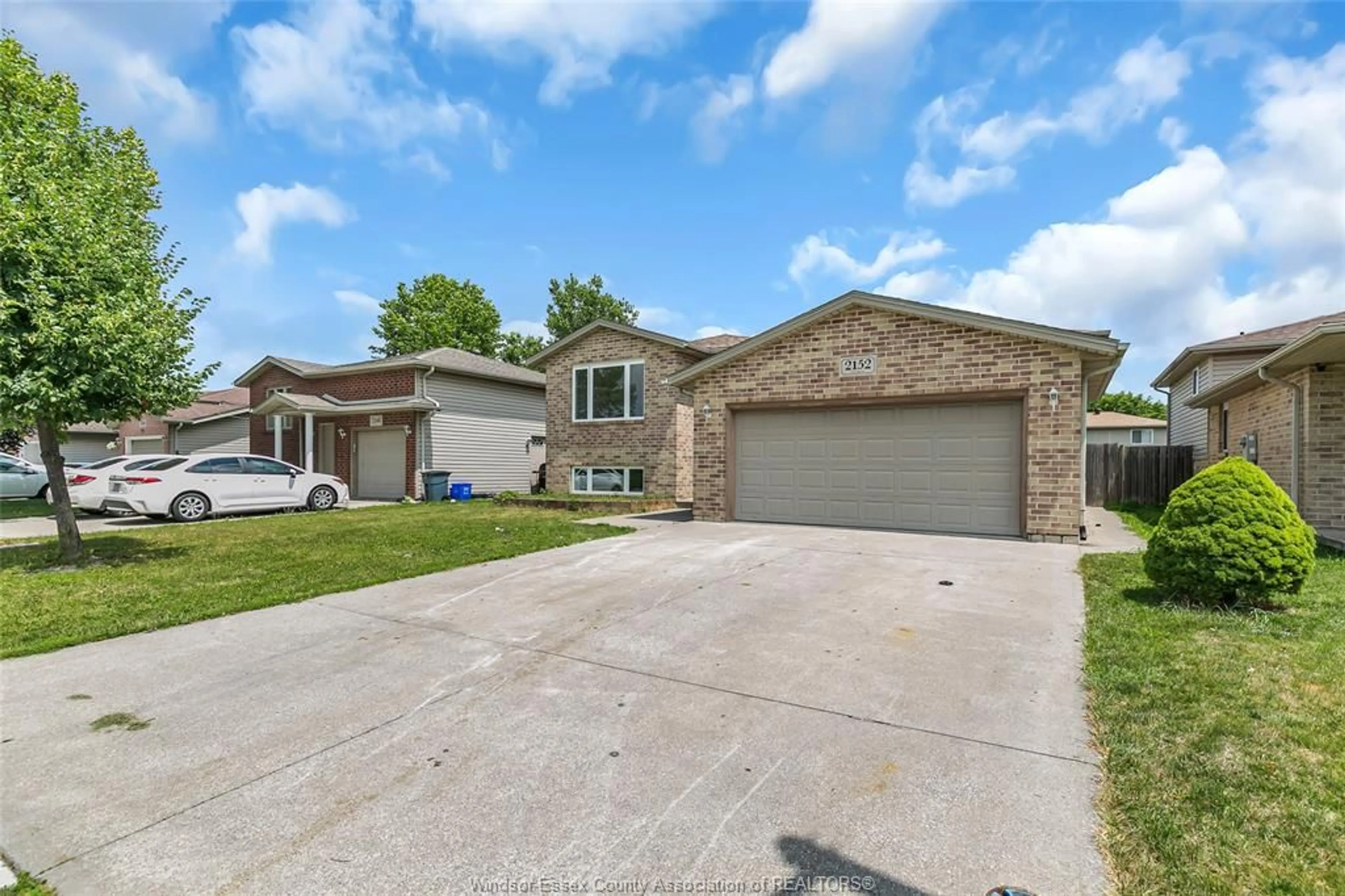 Home with brick exterior material, street for 2152 CURRY, Windsor Ontario N9B 3X4