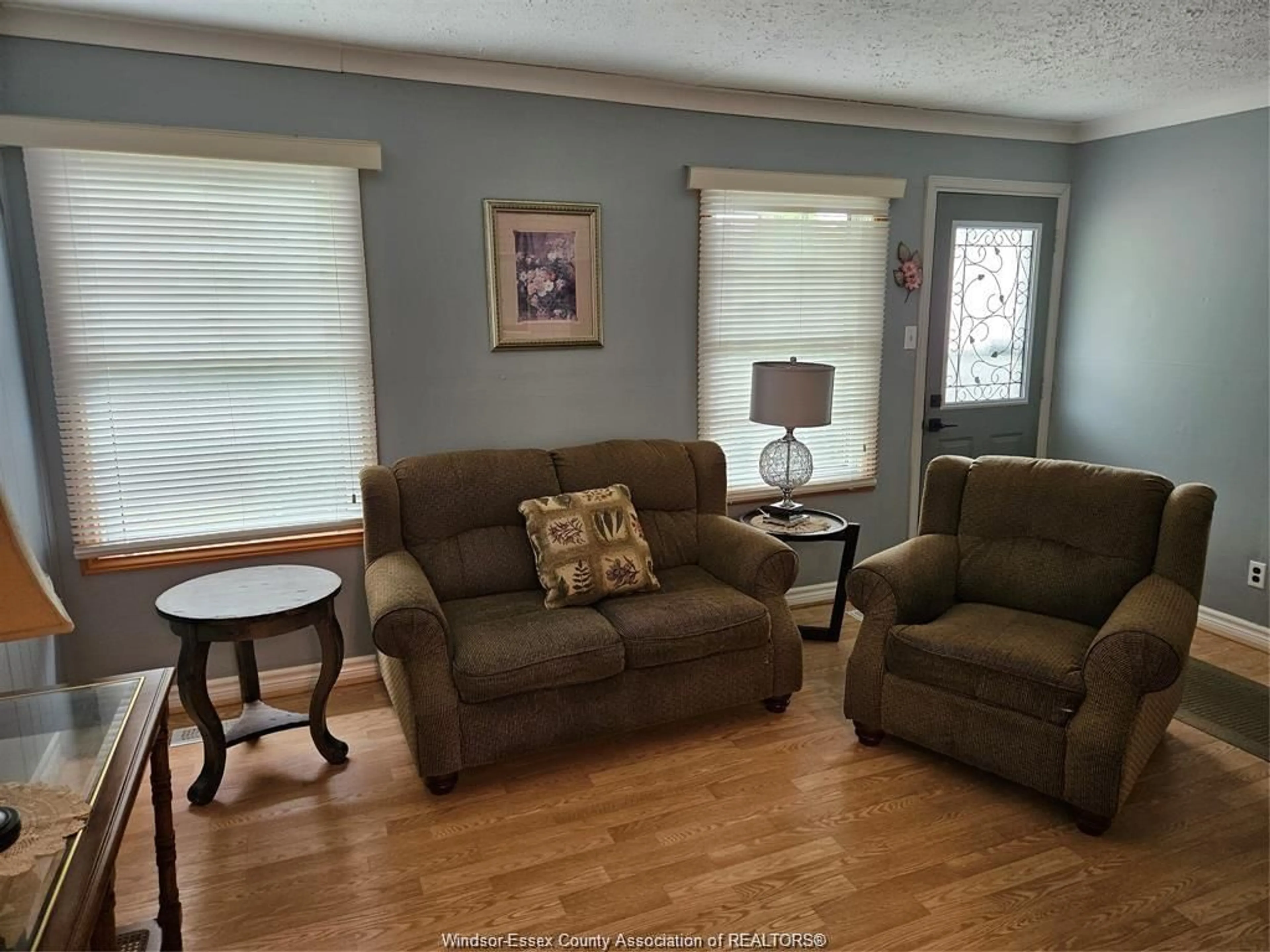 Living room with furniture, wood/laminate floor for 1709 CENTRAL, Windsor Ontario N8Y 3W3