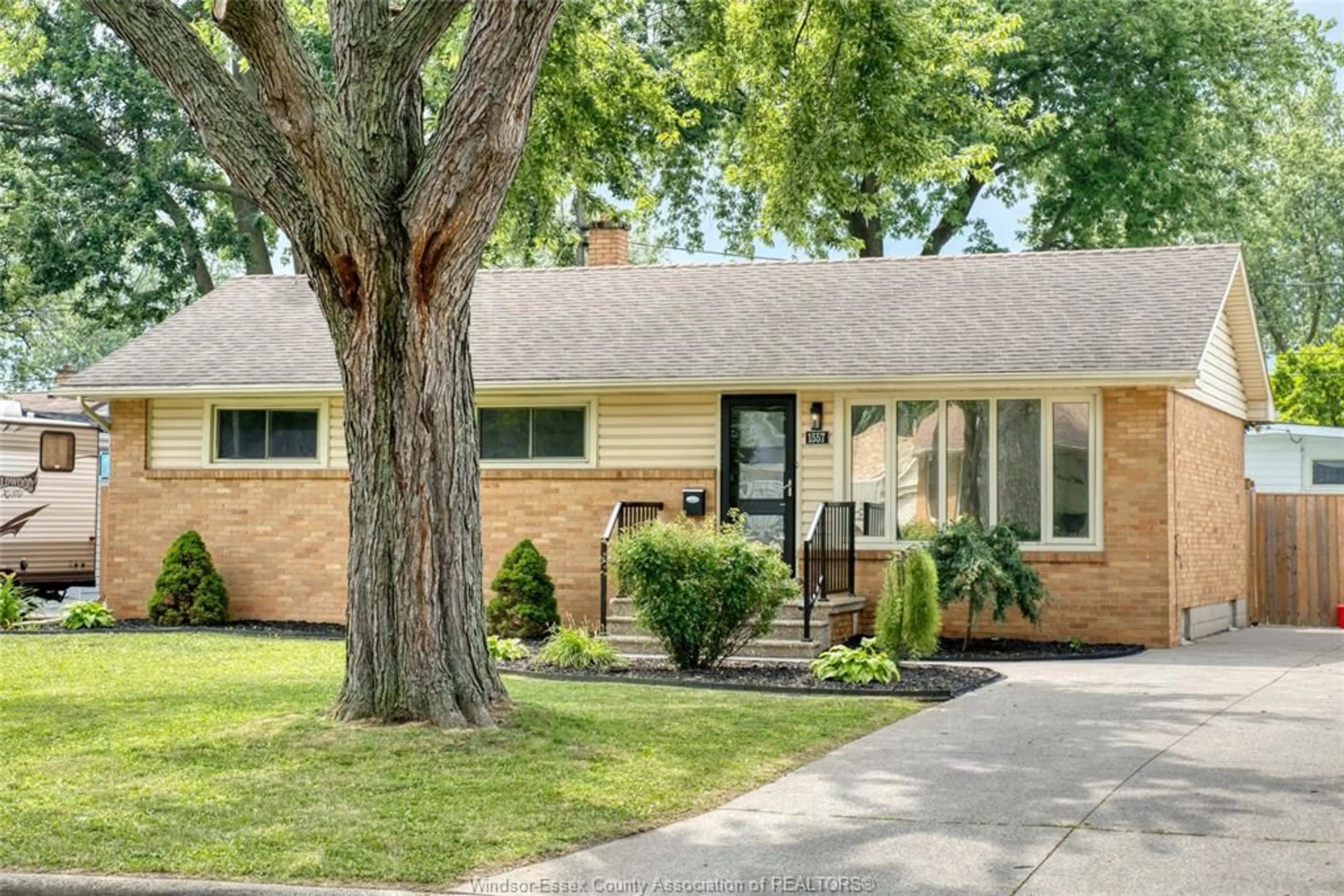 Home with brick exterior material, street for 1557 ST. GABRIEL Crt, Windsor Ontario N9E 1N8