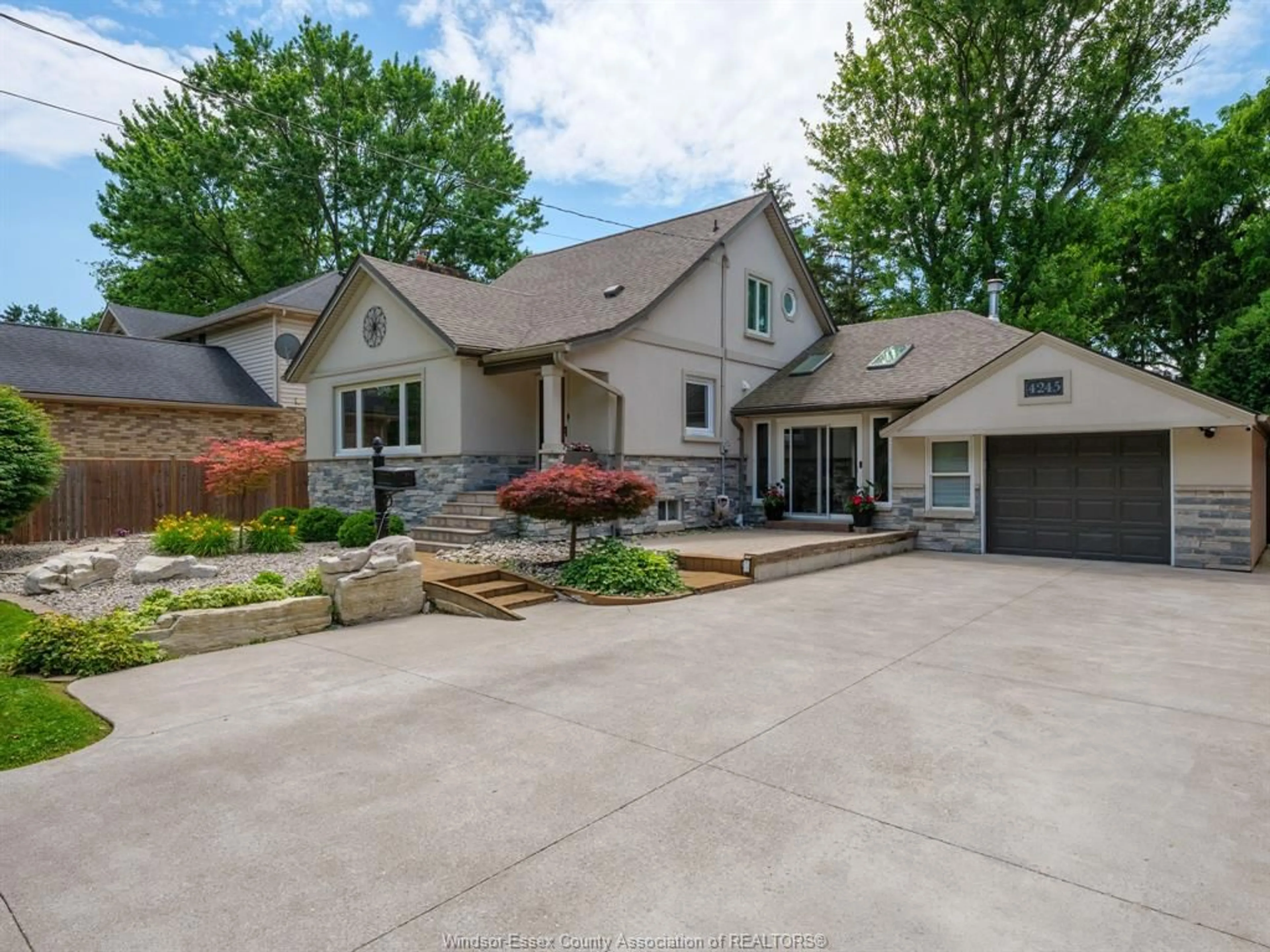 Home with brick exterior material, street for 4245 KENNEDY Dr, Windsor Ontario N9G 1Y1