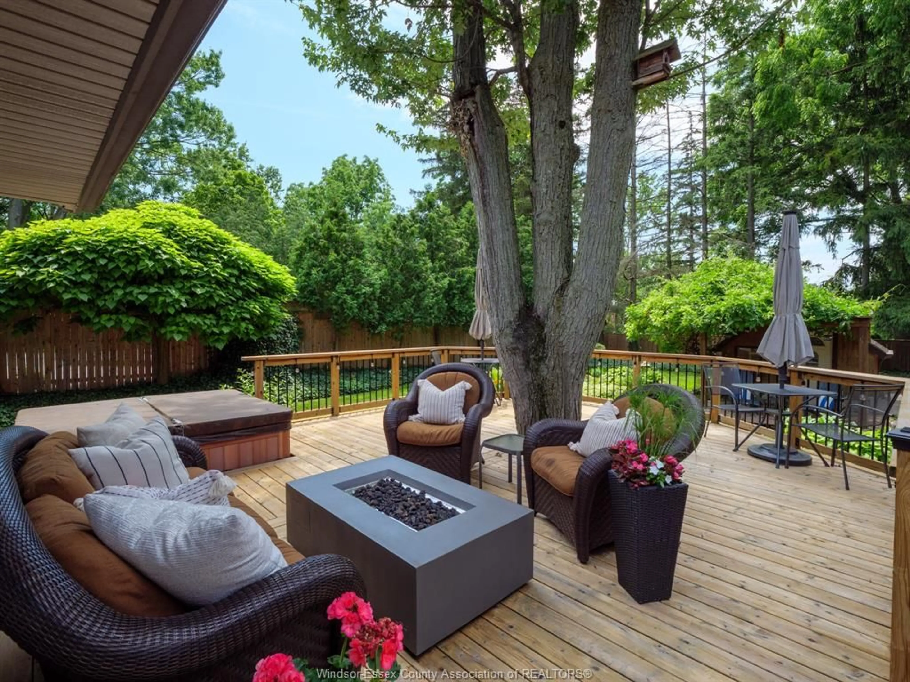 Patio, forest/trees view for 4245 KENNEDY Dr, Windsor Ontario N9G 1Y1
