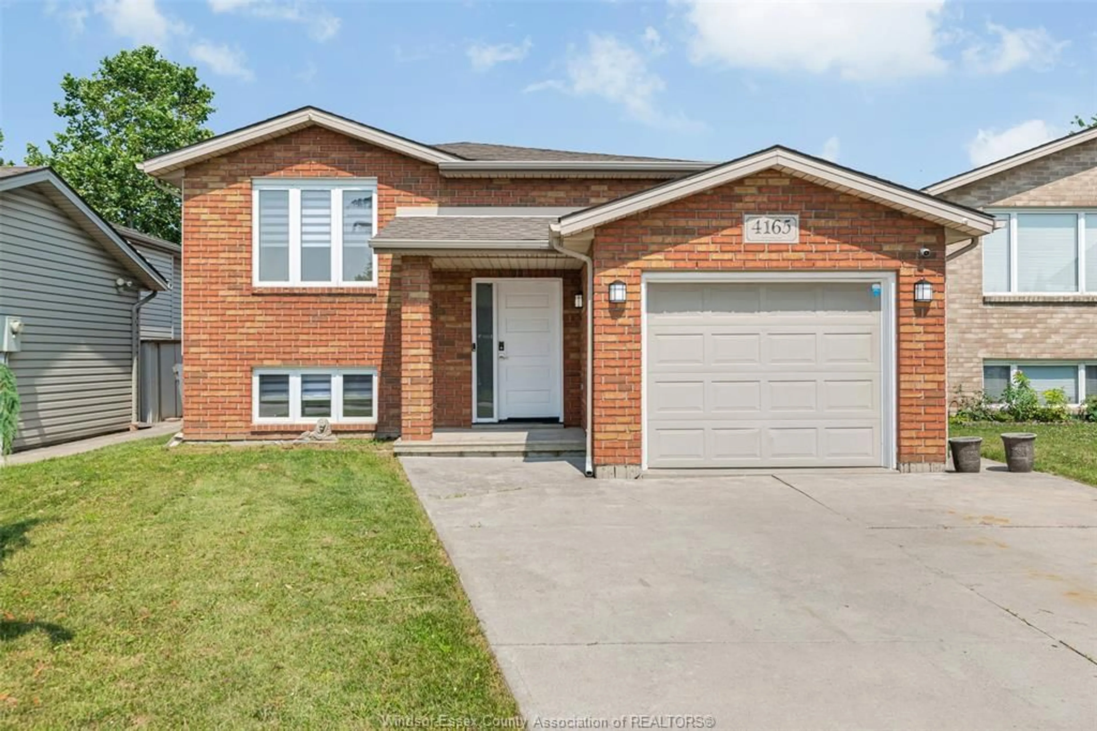 Home with brick exterior material, street for 4165 ANTHONY COURT, Windsor Ontario N8W 5S9