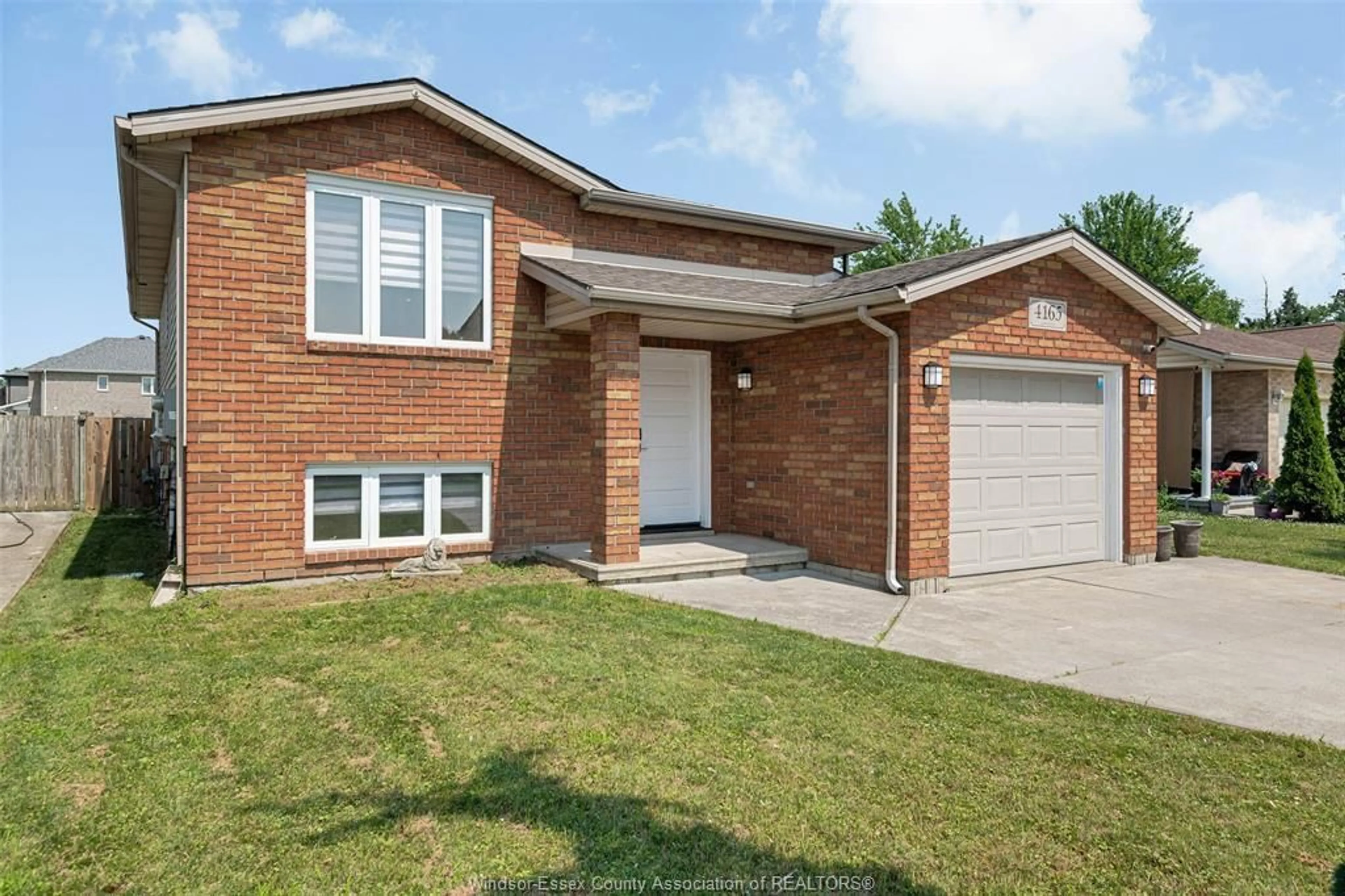Home with brick exterior material, street for 4165 ANTHONY COURT, Windsor Ontario N8W 5S9
