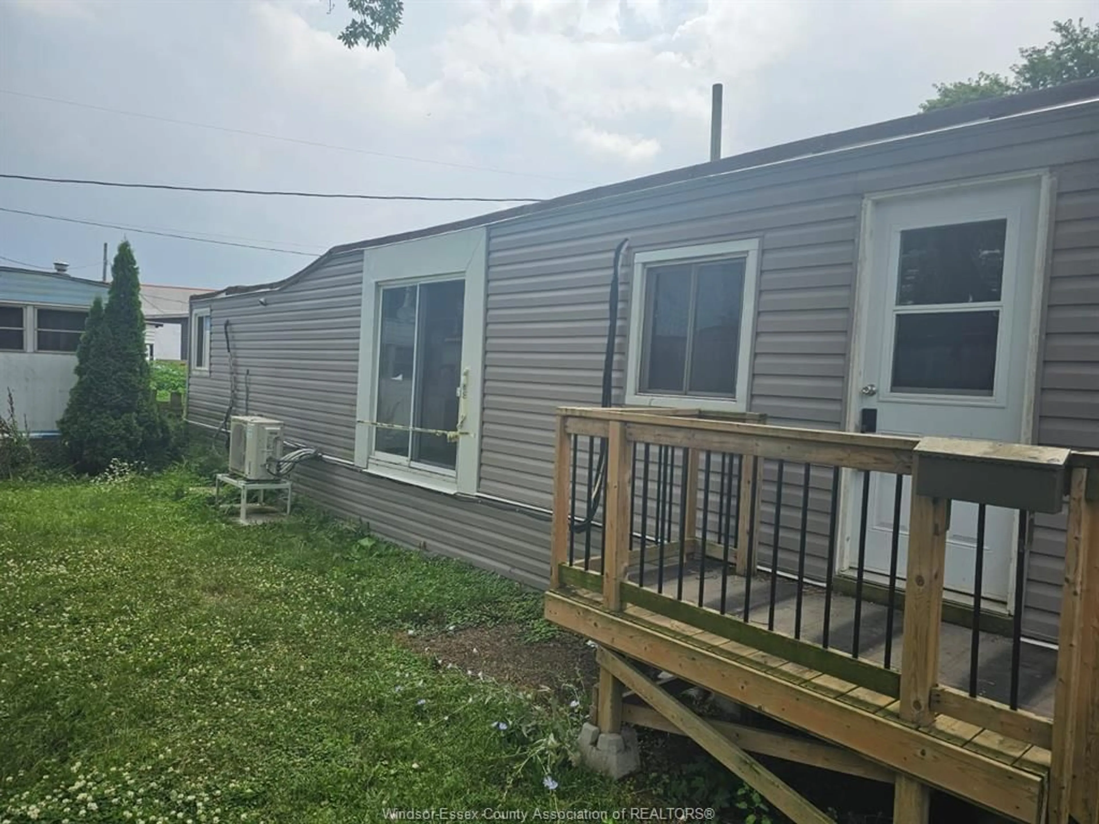 Home with vinyl exterior material, unknown for 216 BARRACUDA, Windsor Ontario N8W 2B1