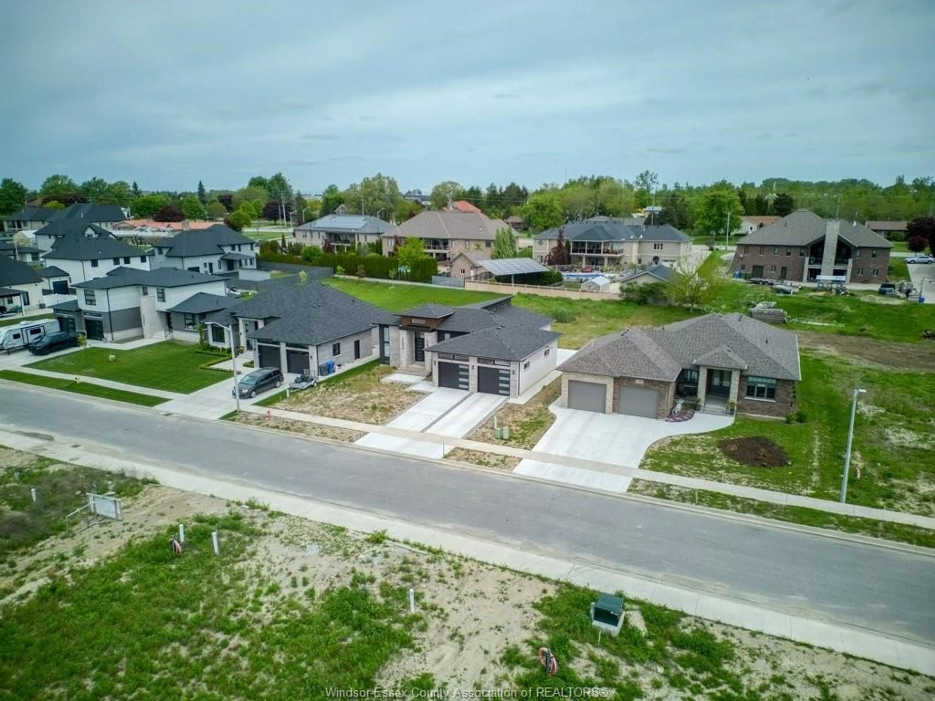 A pic from outside/outdoor area/front of a property/back of a property/a pic from drone, street for 1936 VILLA CANAL, Ruthven Ontario N0R 2G0