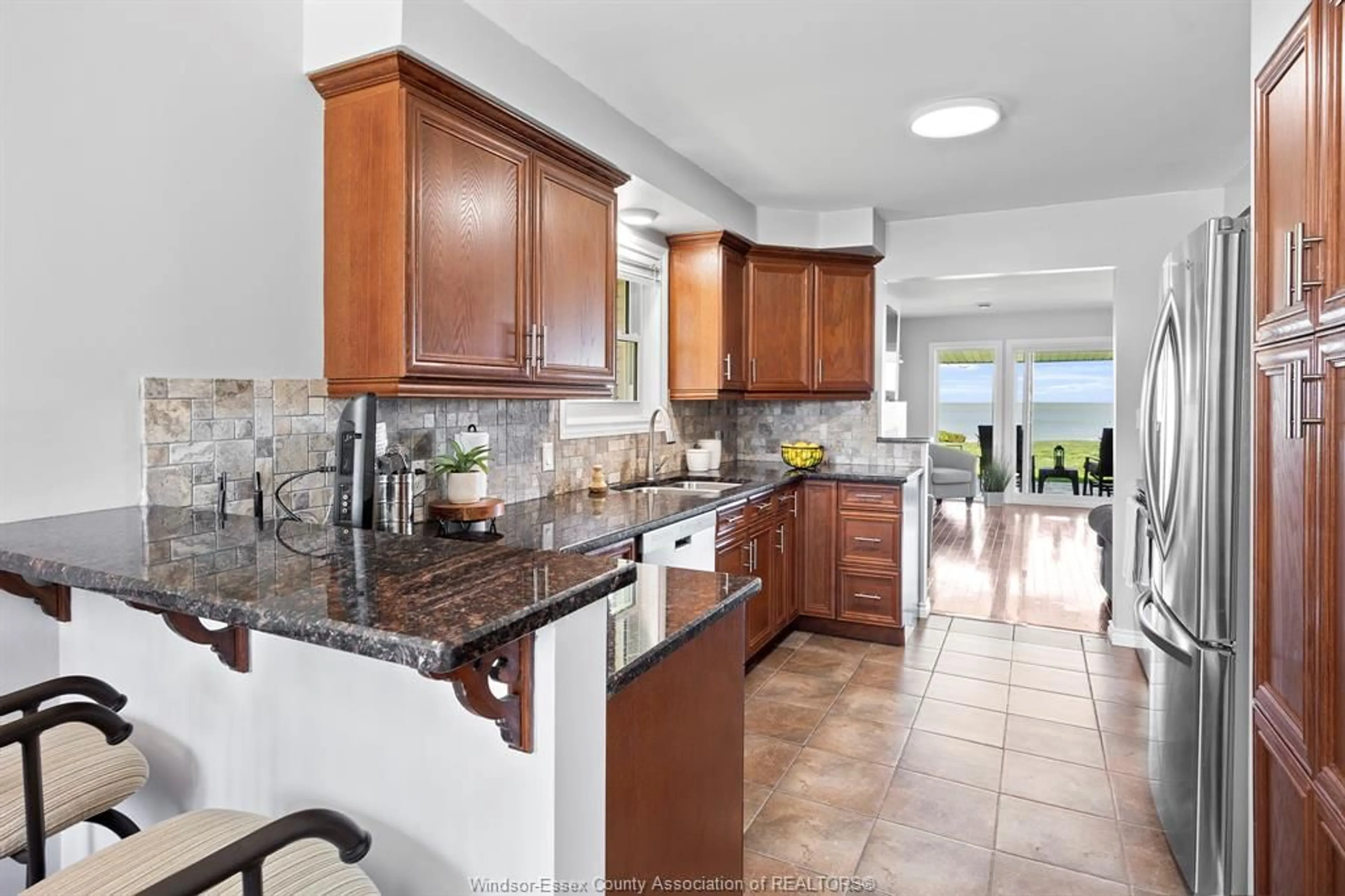 Open concept kitchen, ceramic/tile floor for 451 CHARRON BEACH Rd, Lakeshore Ontario N8L 1J5
