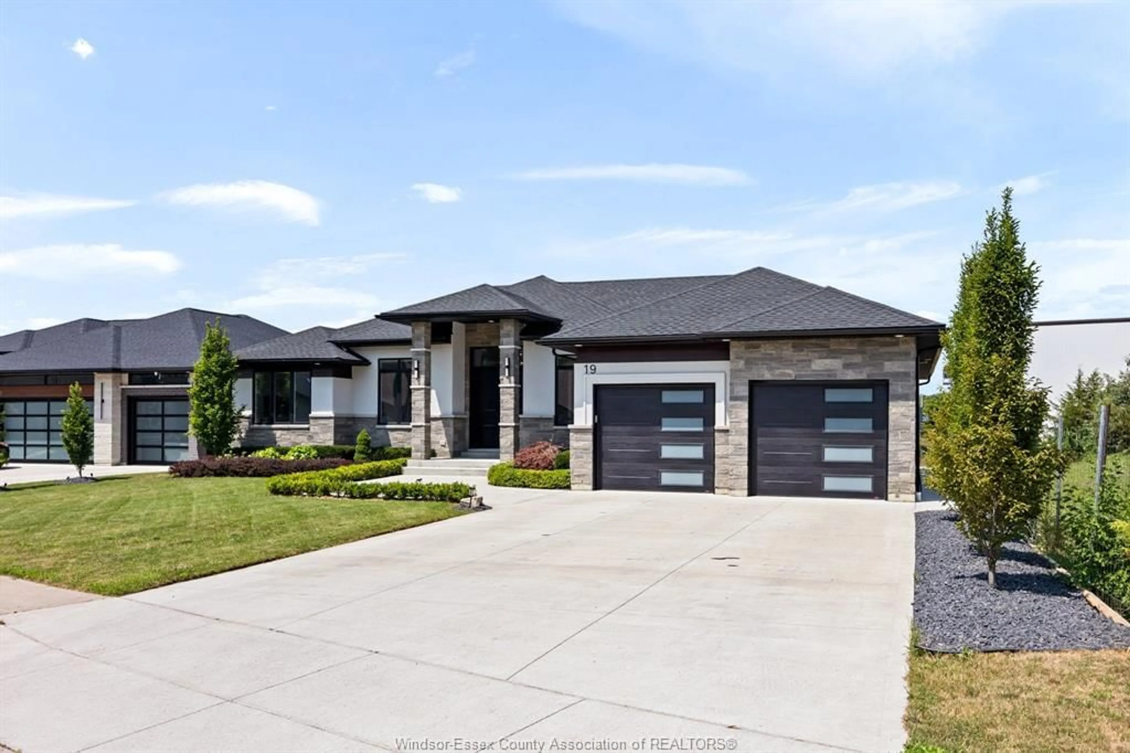 Home with brick exterior material, street for 19 EMILY Ave, Kingsville Ontario N9Y 0C7