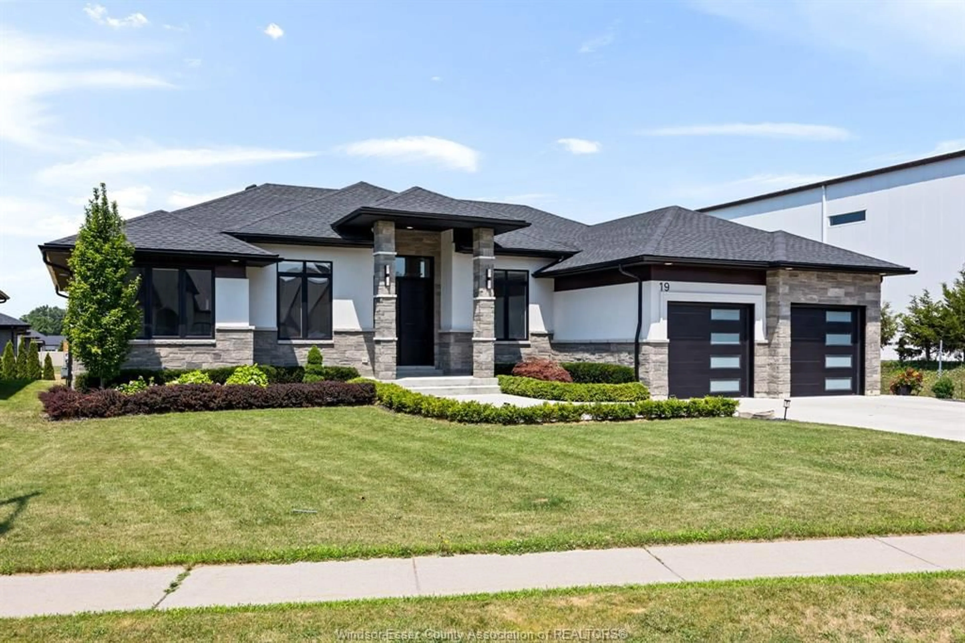 Home with brick exterior material, street for 19 EMILY Ave, Kingsville Ontario N9Y 0C7