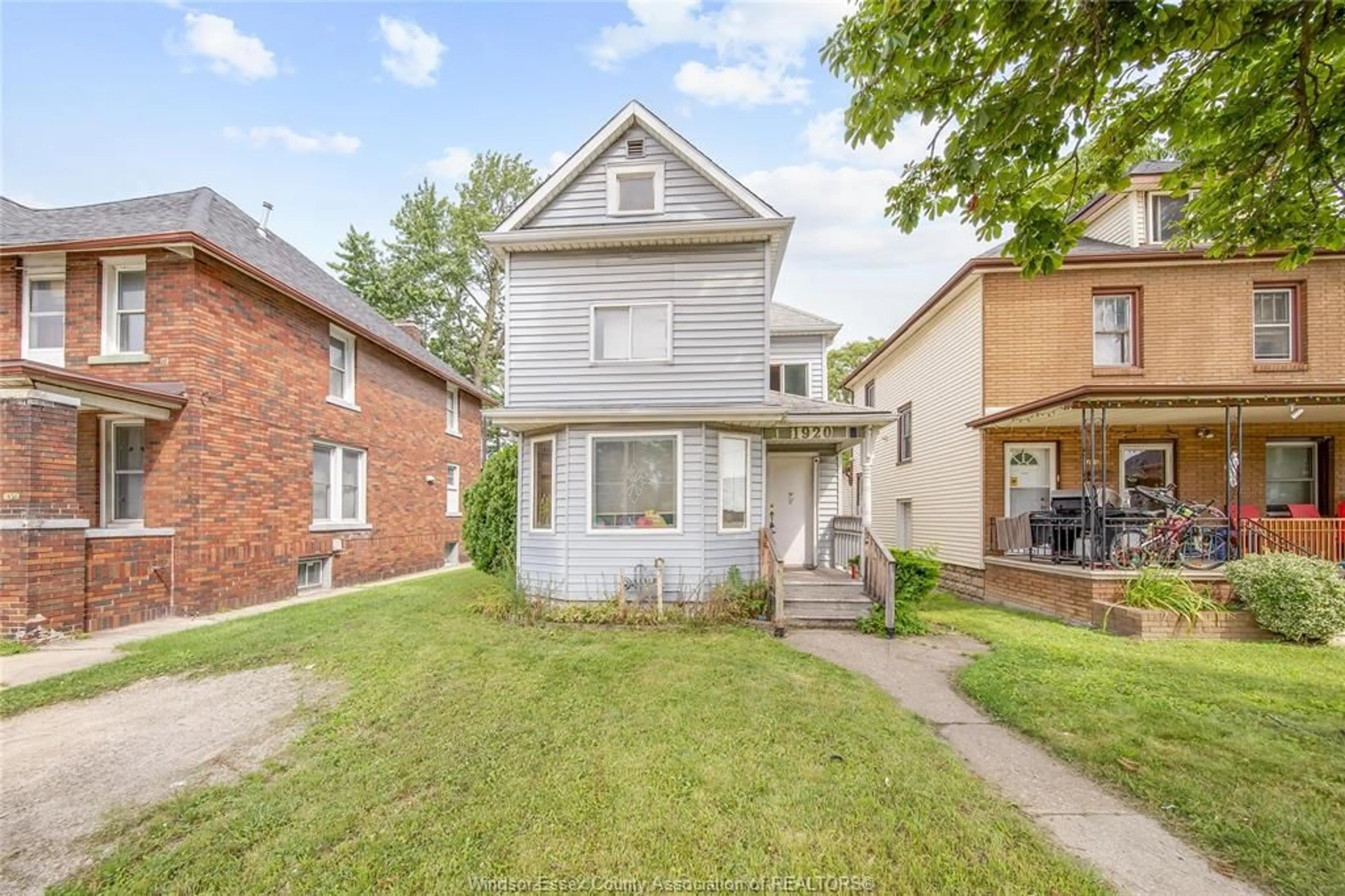 Home with brick exterior material, street for 1920 UNIVERSITY Ave, Windsor Ontario N9C 1C8