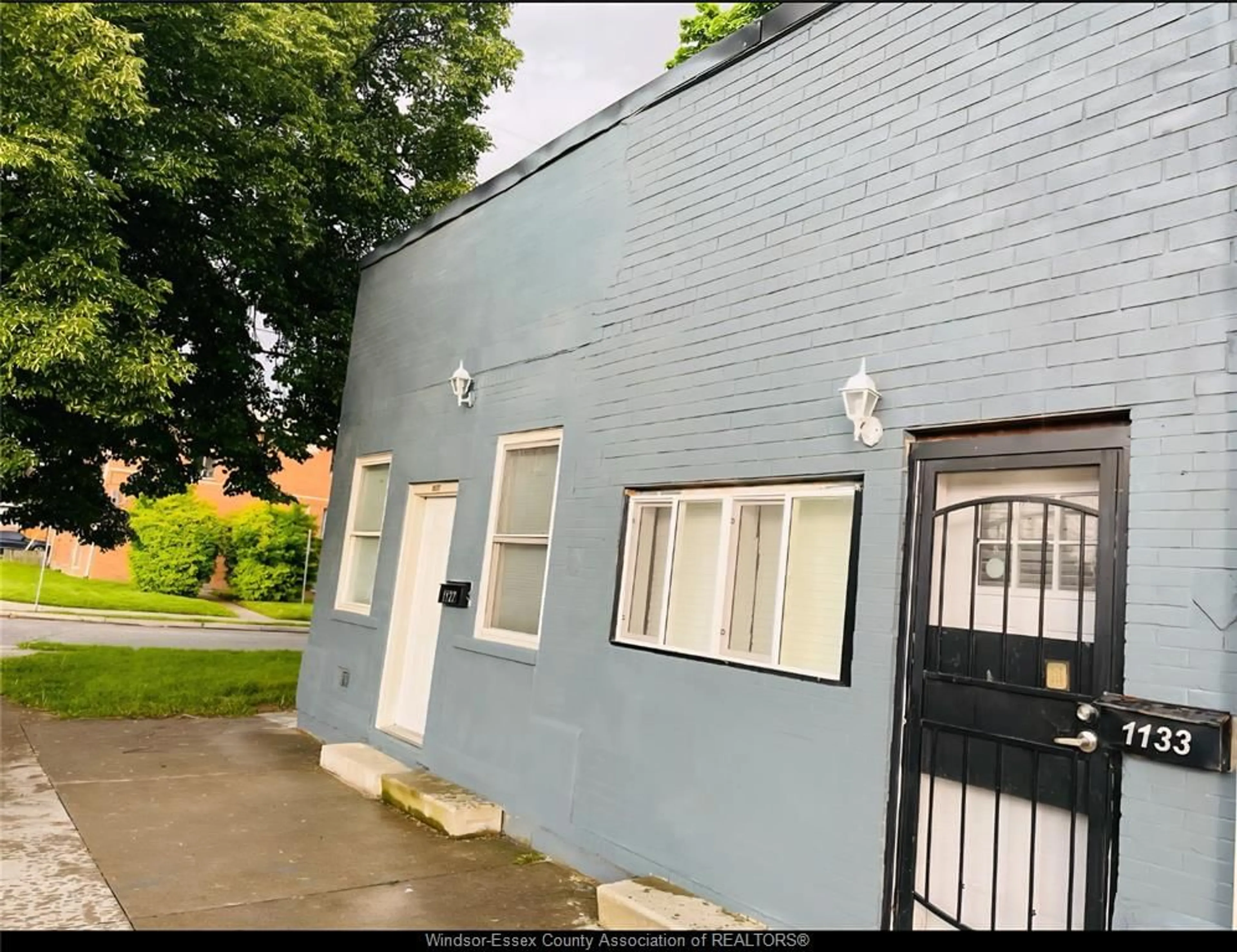 A pic from outside/outdoor area/front of a property/back of a property/a pic from drone, building for 1133 Erie St W, Windsor Ontario N9A 6C6