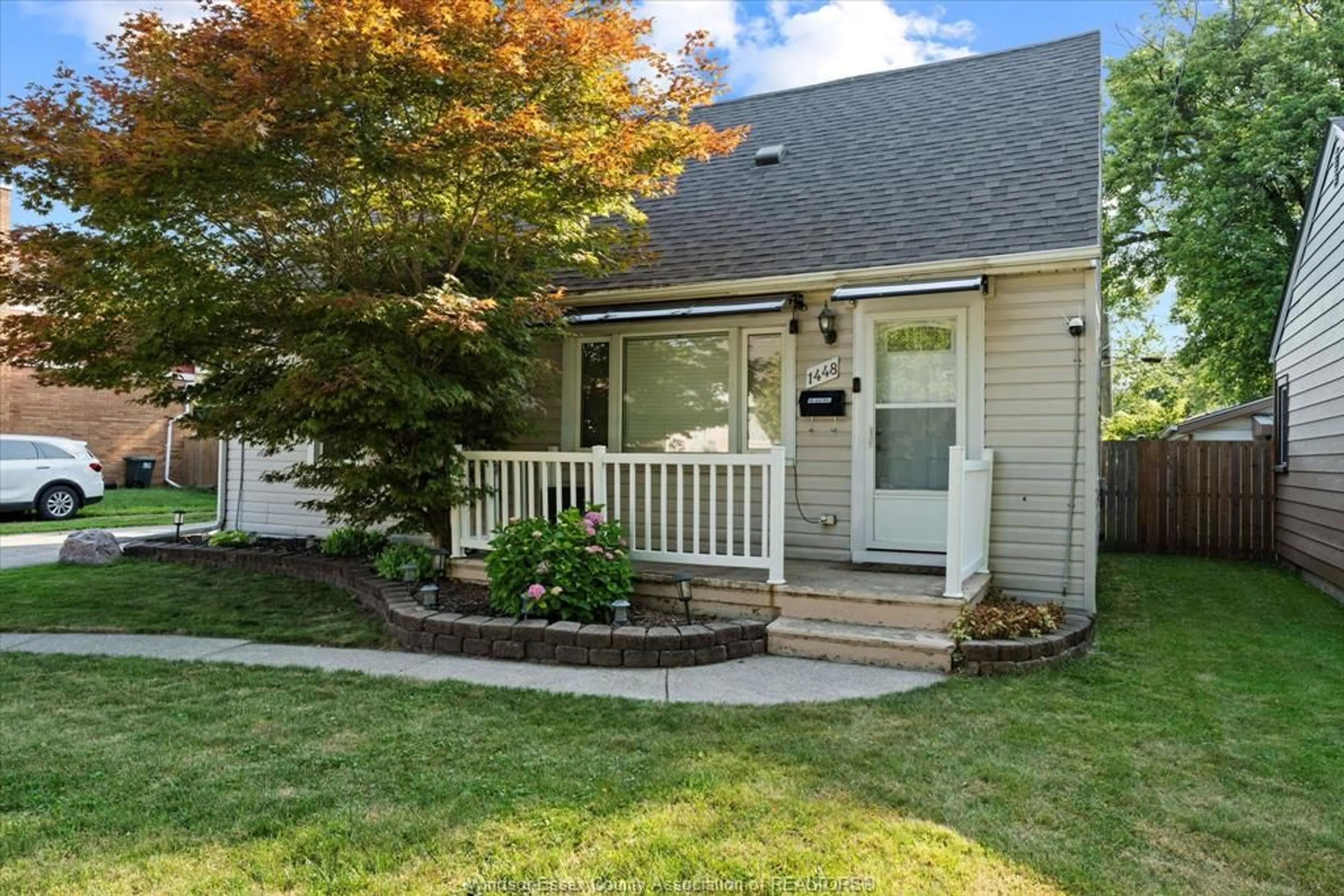Home with vinyl exterior material, street for 1448 OLIVE, Windsor Ontario N8Y 4M4