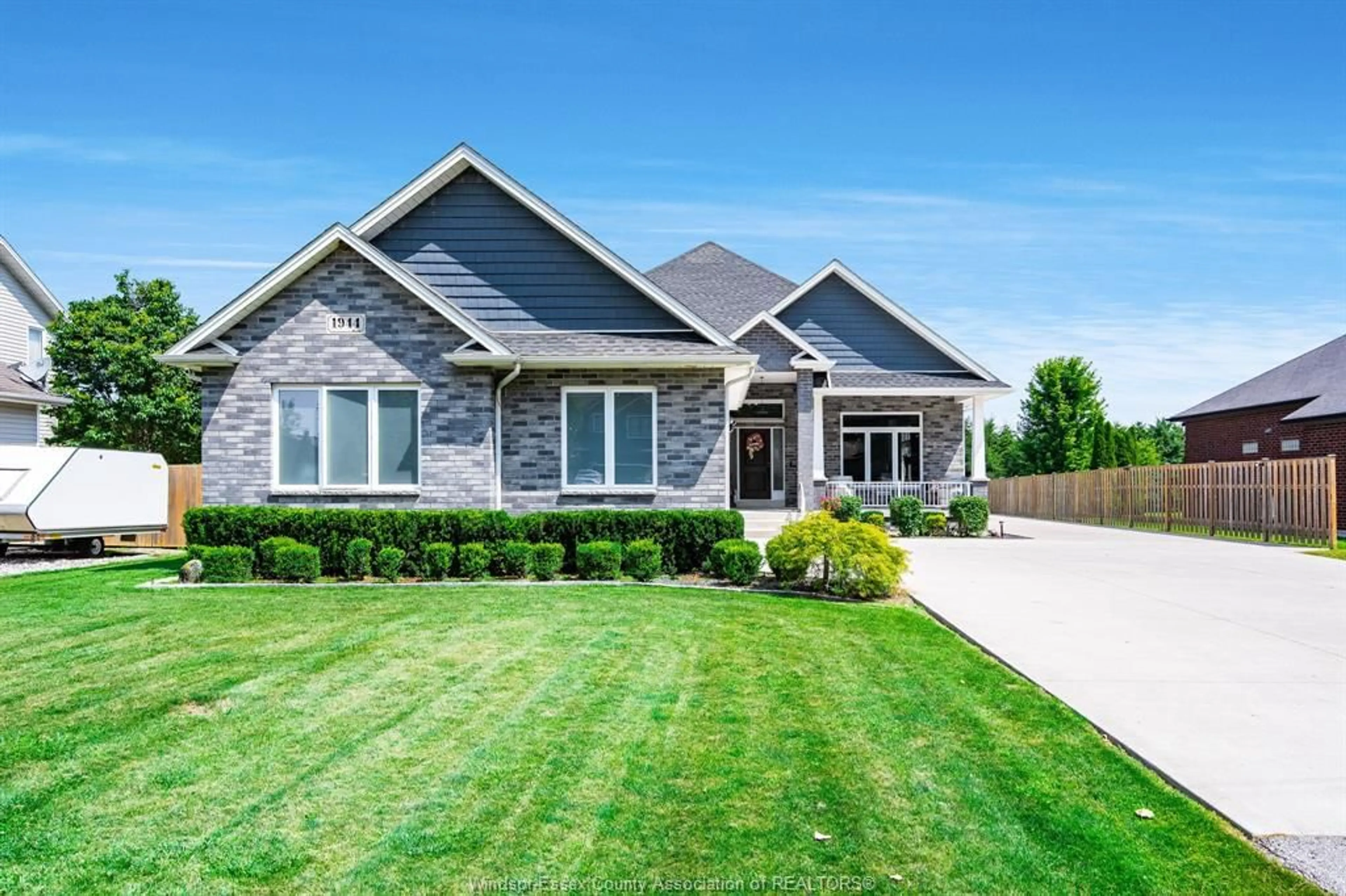 Home with brick exterior material, street for 1944 Heritage Rd, Kingsville Ontario N9Y 2E6