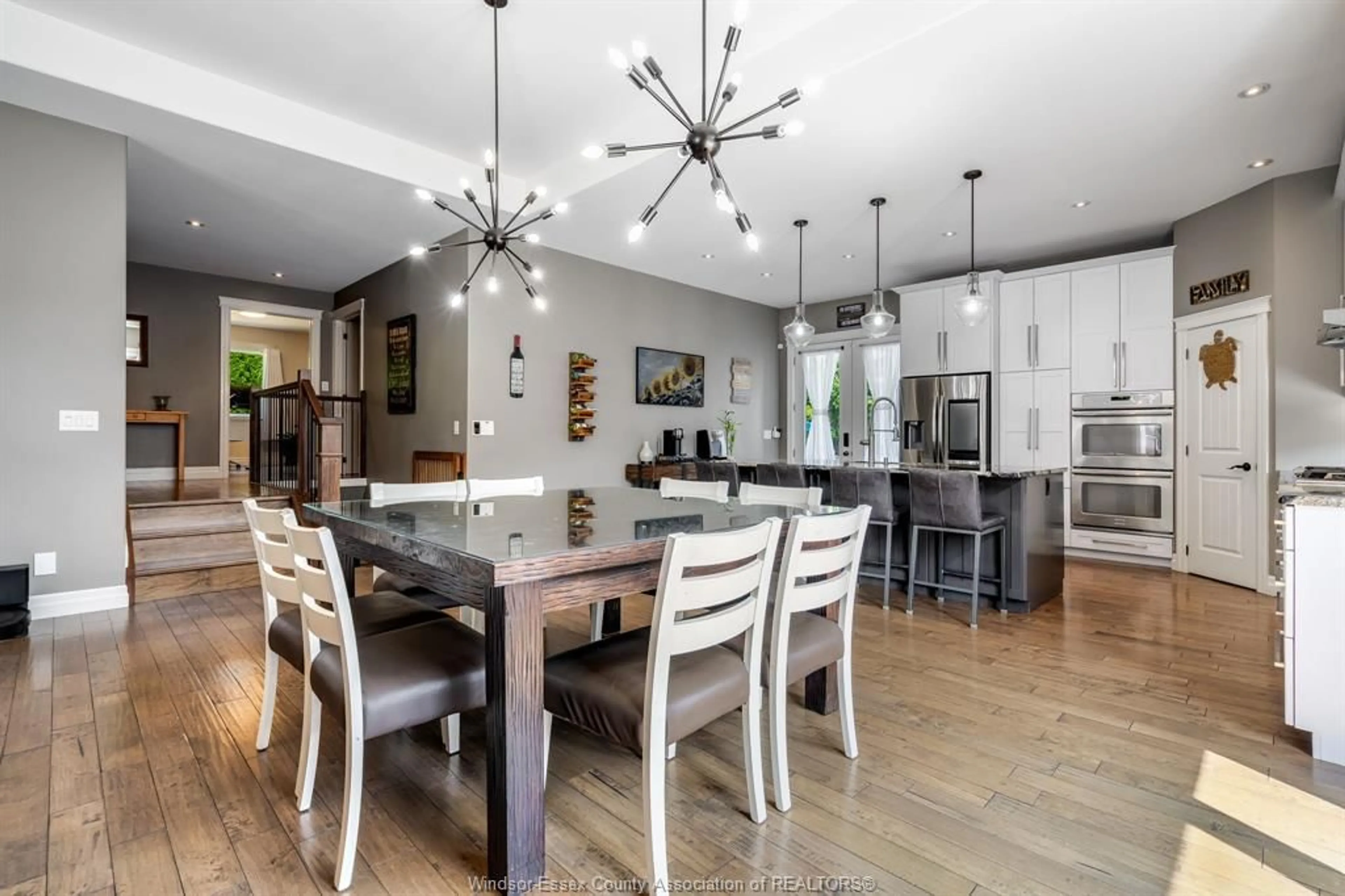 Open concept kitchen, wood/laminate floor for 1944 Heritage Rd, Kingsville Ontario N9Y 2E6