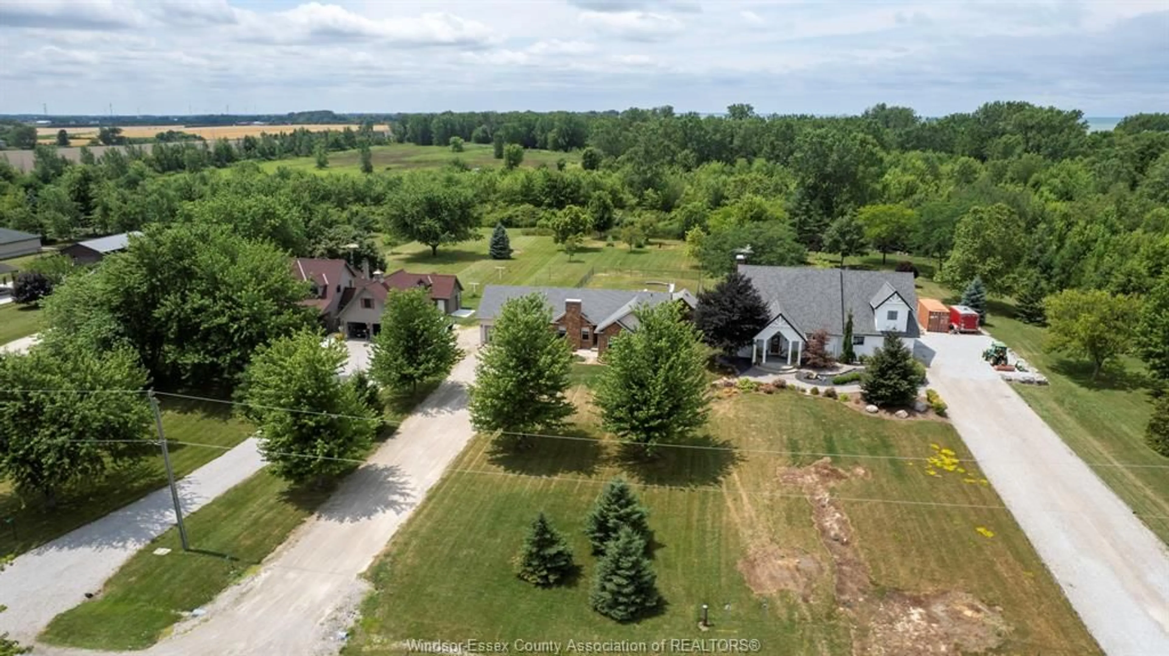 A pic from outside/outdoor area/front of a property/back of a property/a pic from drone, unknown for 121 SURF CLUB Dr, Lakeshore Ontario N0R 1S0