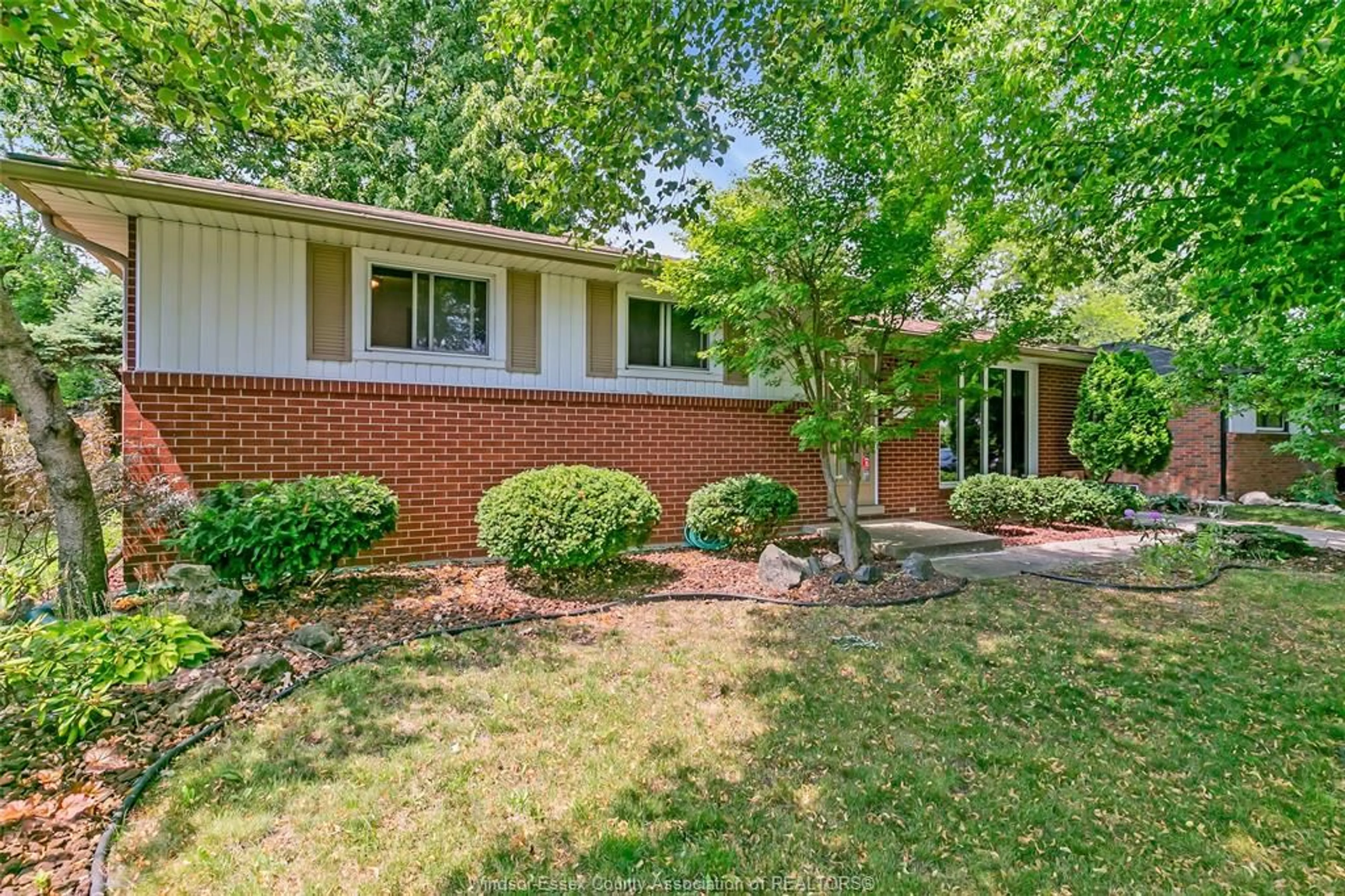 Home with brick exterior material, street for 2891 RIVIERA, Windsor Ontario N9E 3A5