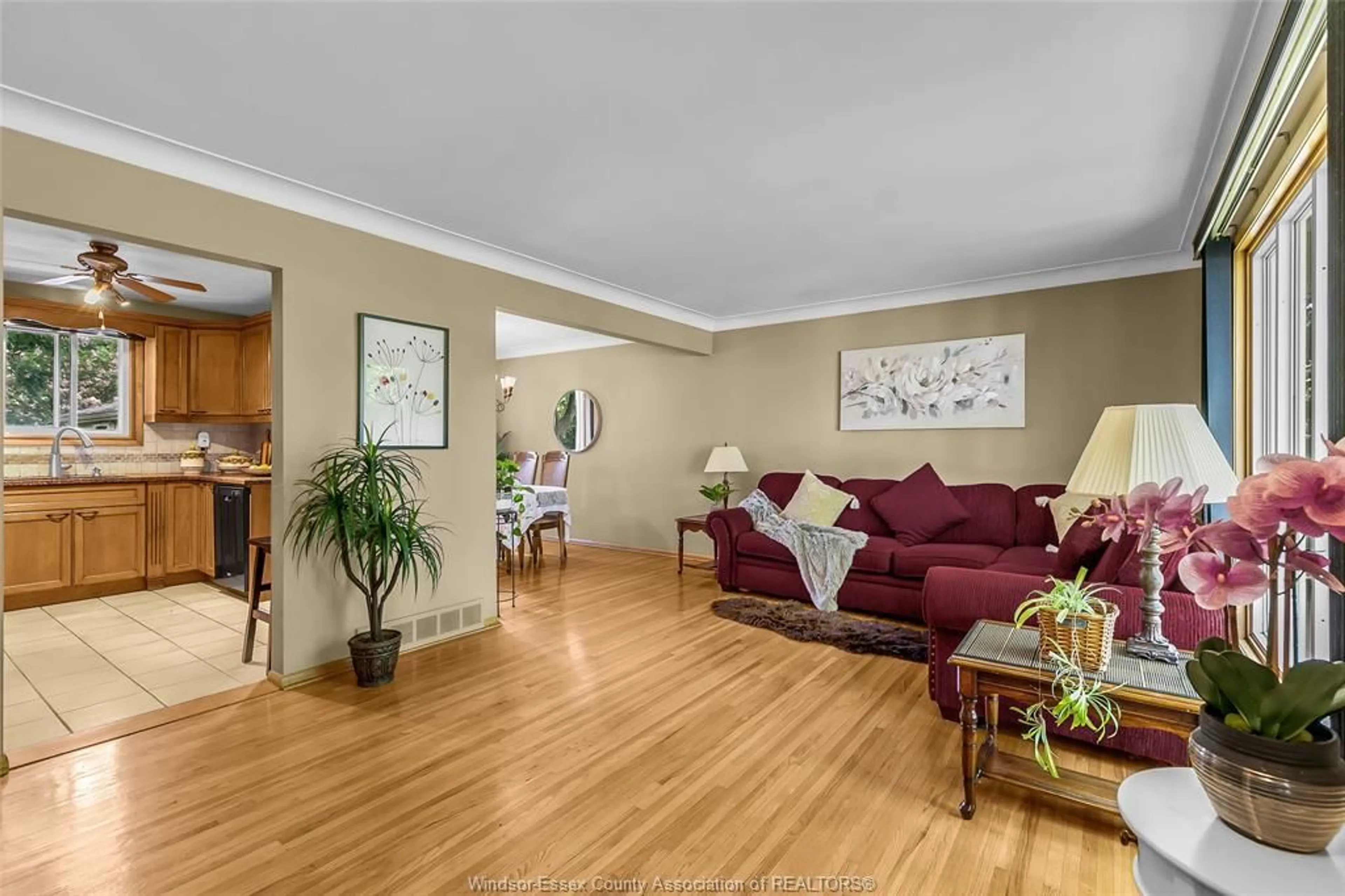 Living room with furniture, wood/laminate floor for 2891 RIVIERA, Windsor Ontario N9E 3A5