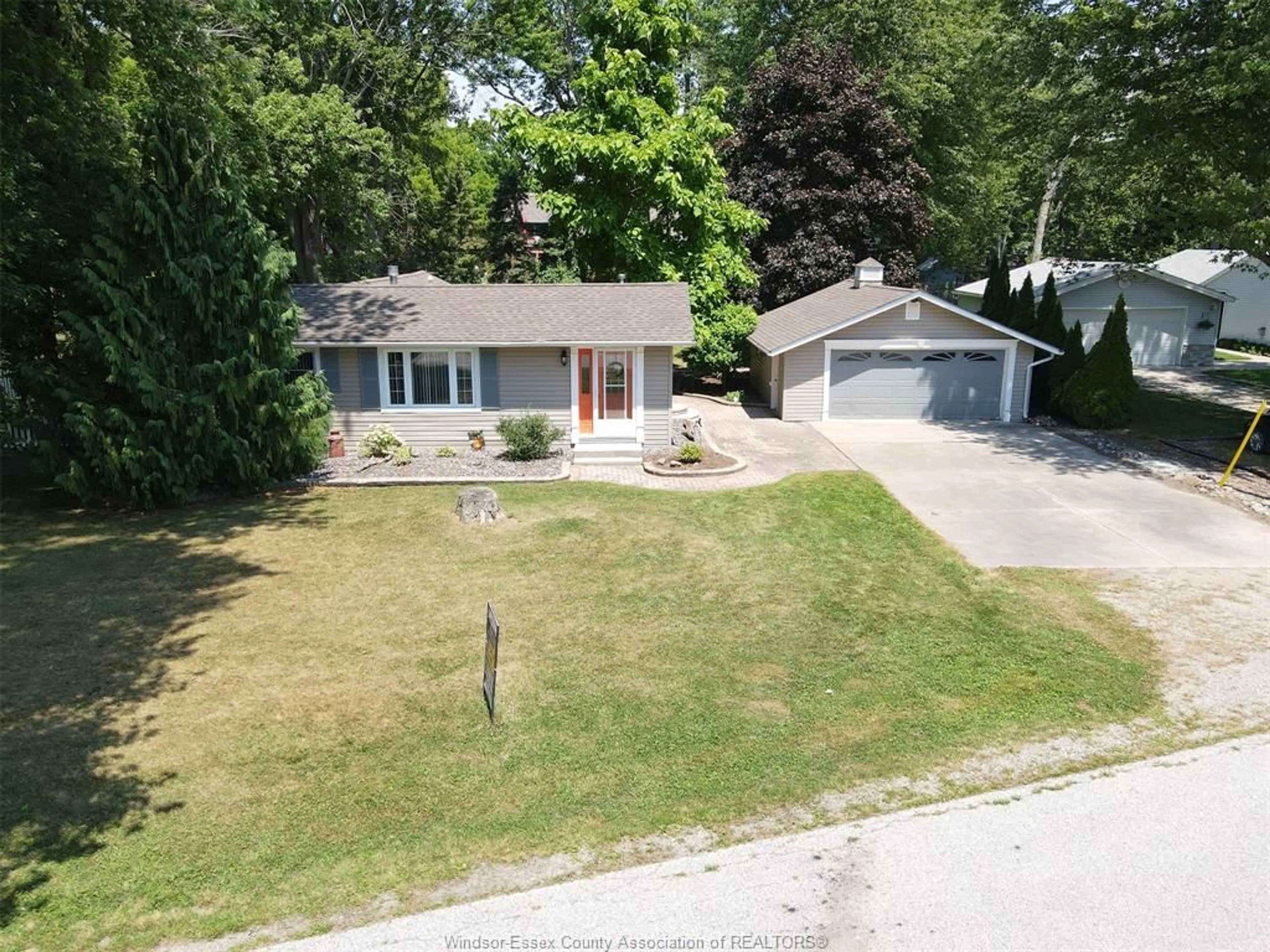 A pic from outside/outdoor area/front of a property/back of a property/a pic from drone, street for 852 LAWRENCE Ave, Harrow Ontario N0R 1G0