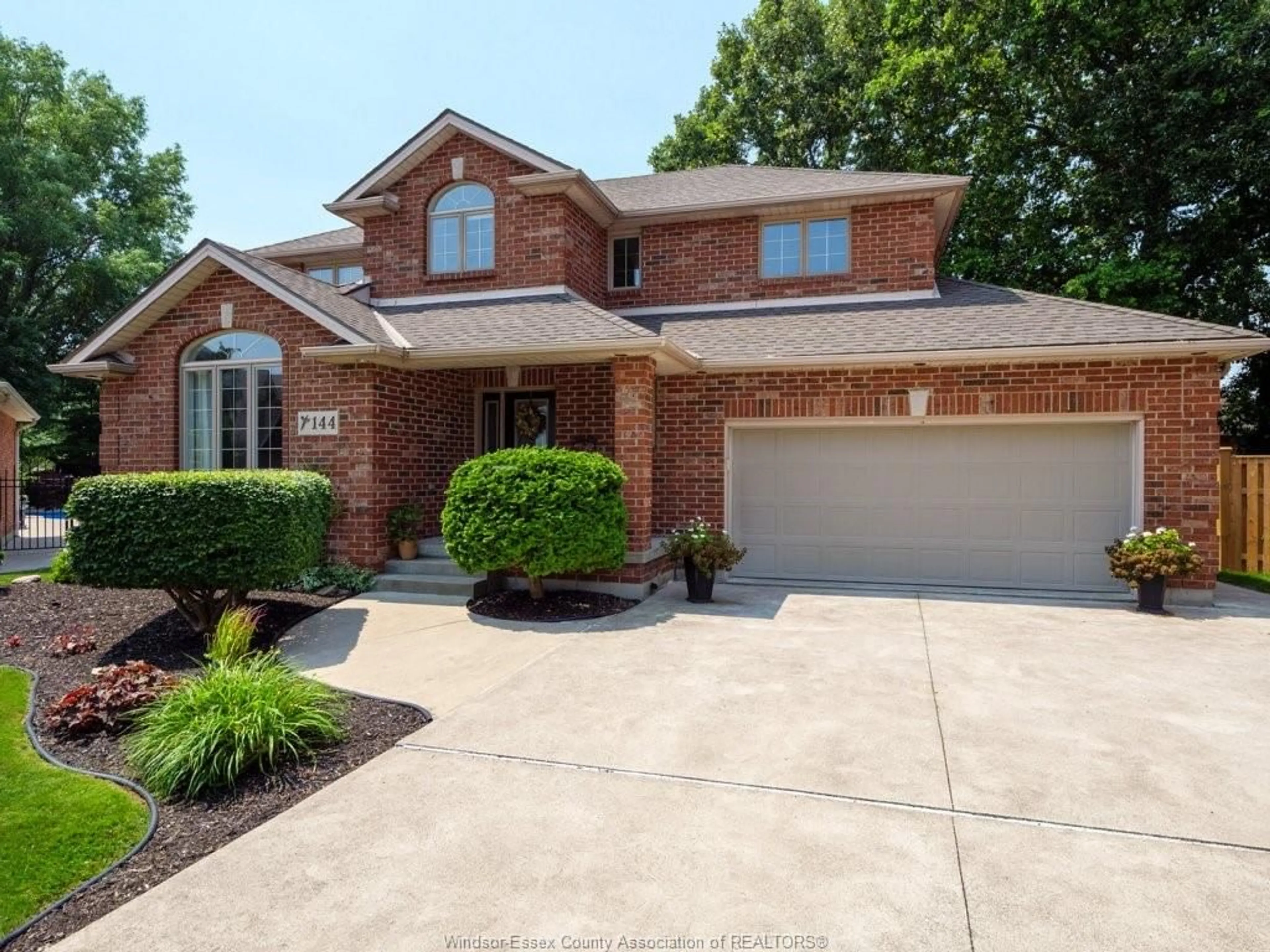 Home with brick exterior material, street for 144 PHEASANT RUN, Lakeshore Ontario N8L 0Z7