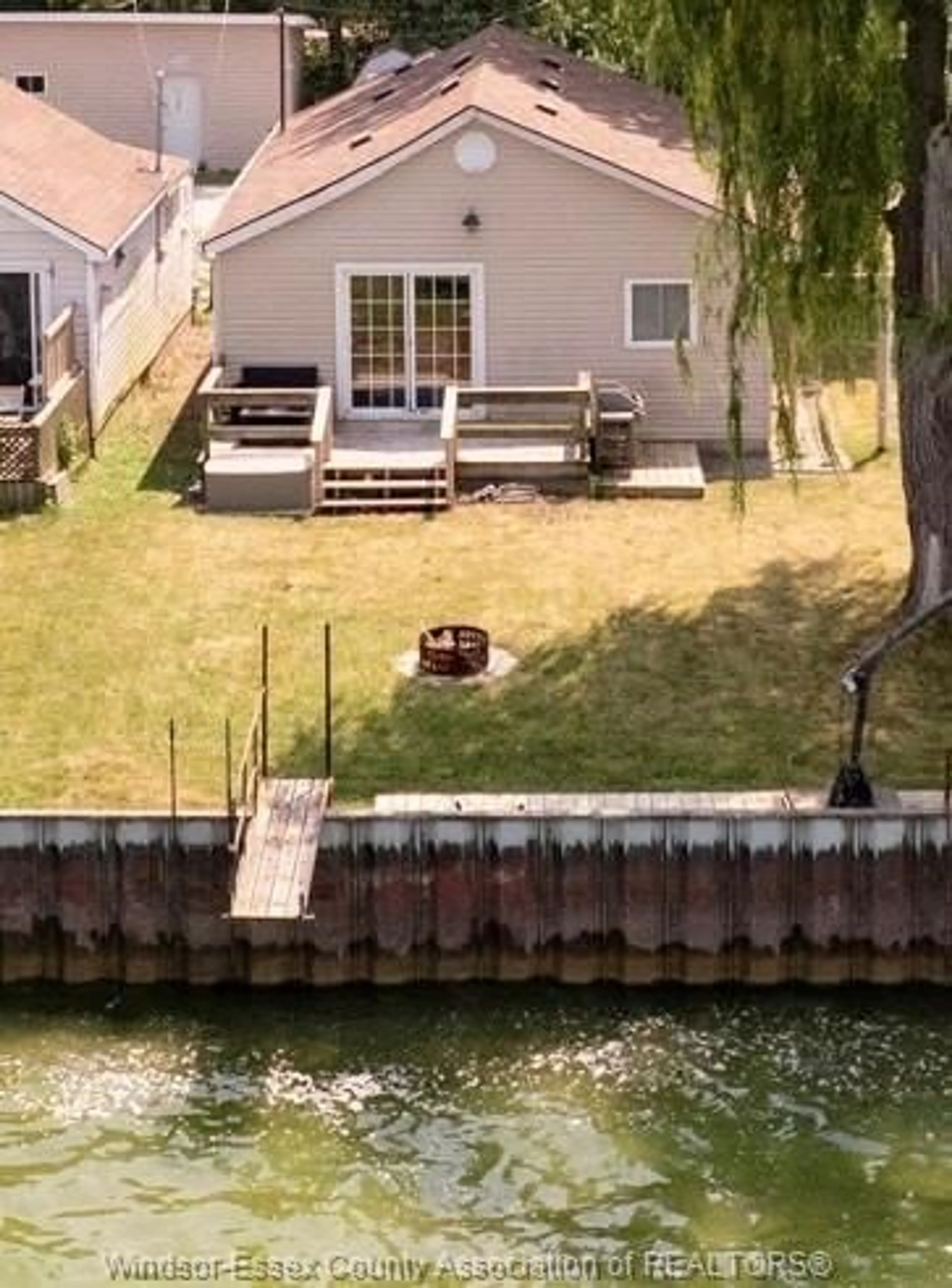 A pic from outside/outdoor area/front of a property/back of a property/a pic from drone, water/lake/river/ocean view for 1458 CAILLE Ave, Lakeshore Ontario N8L 0J2