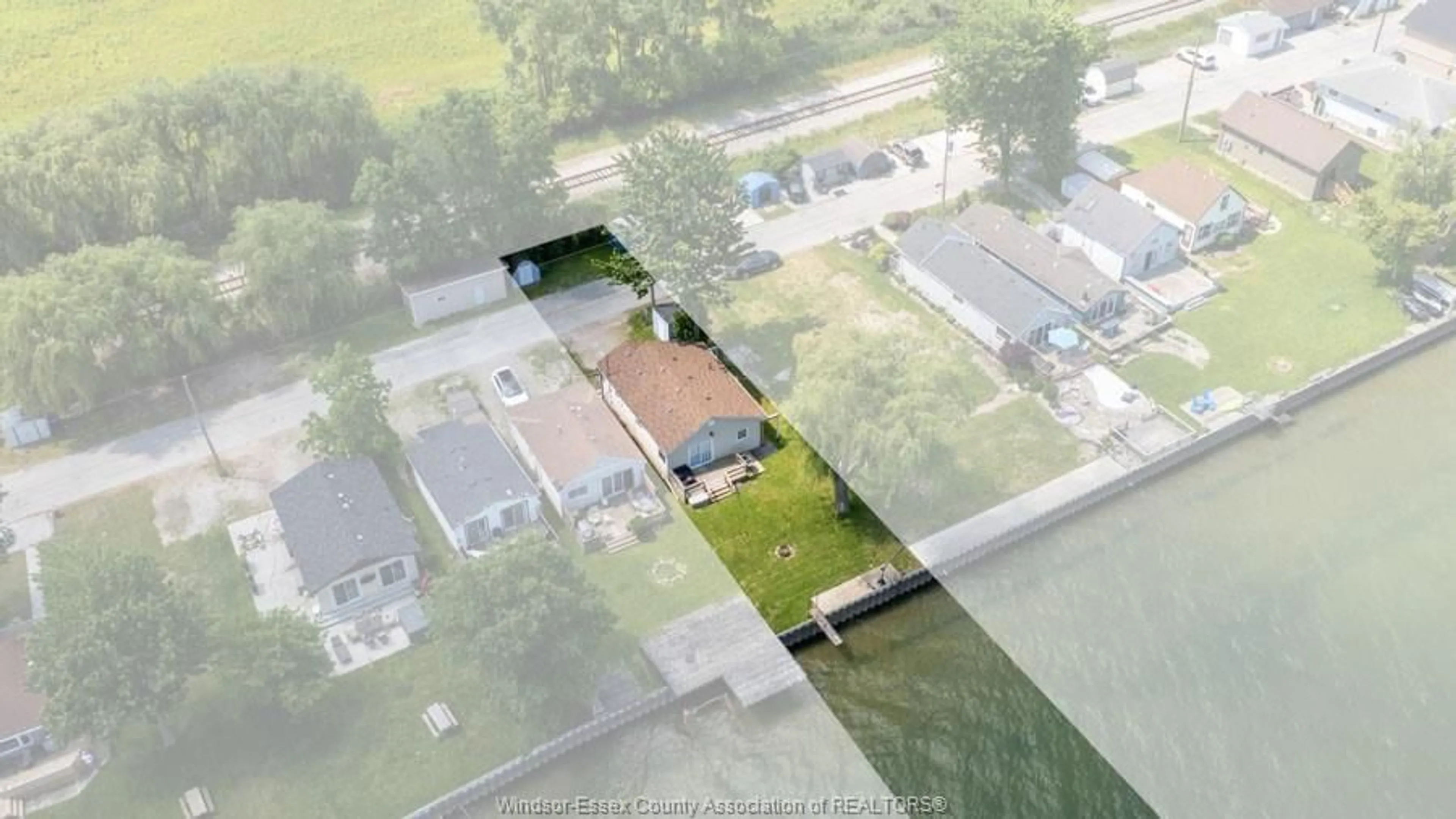 A pic from outside/outdoor area/front of a property/back of a property/a pic from drone, water/lake/river/ocean view for 1458 CAILLE Ave, Lakeshore Ontario N8L 0J2