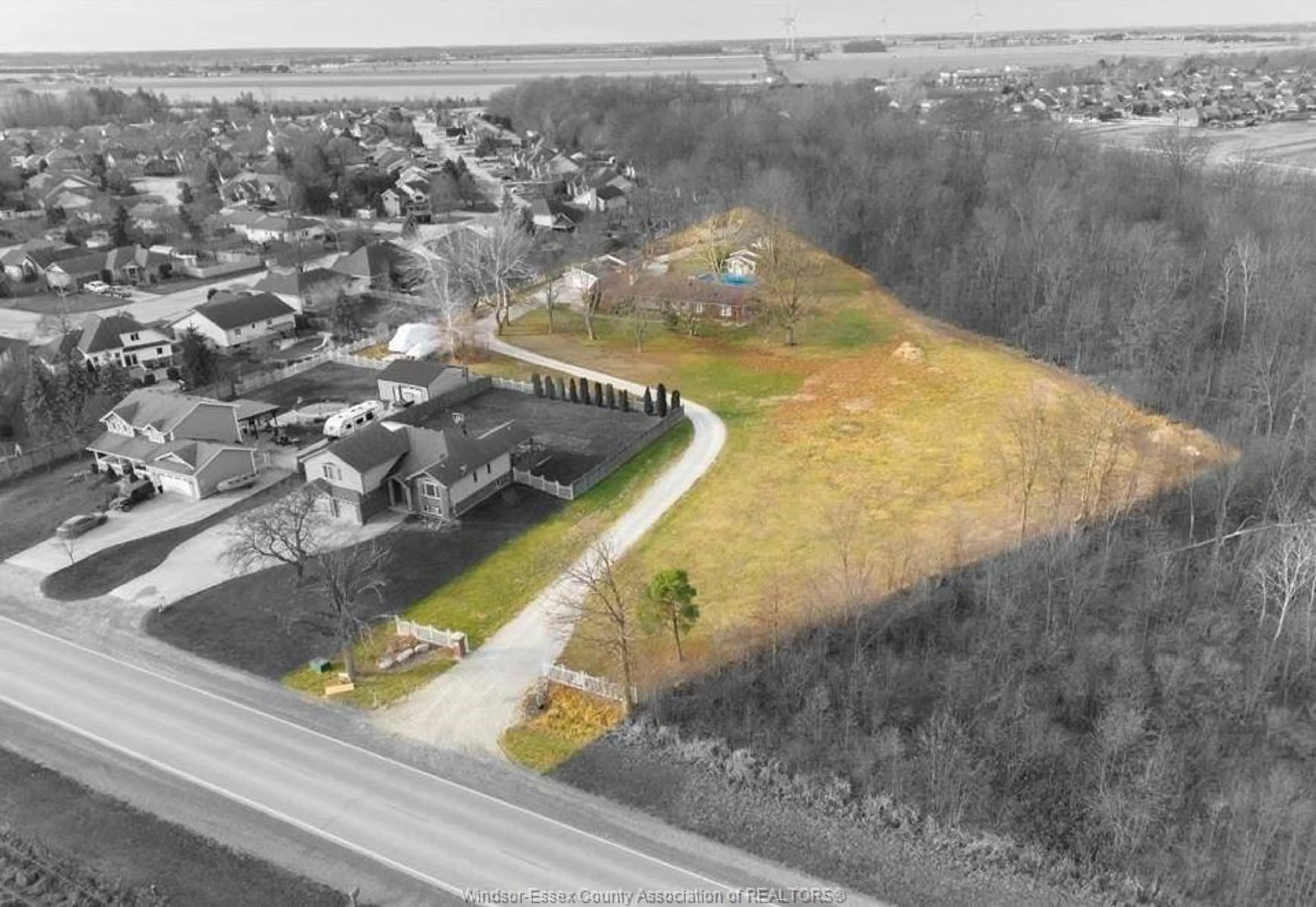 A pic from outside/outdoor area/front of a property/back of a property/a pic from drone, street for 299 GOSFIELD TOWNLINE, Essex Ontario N8M 2X5