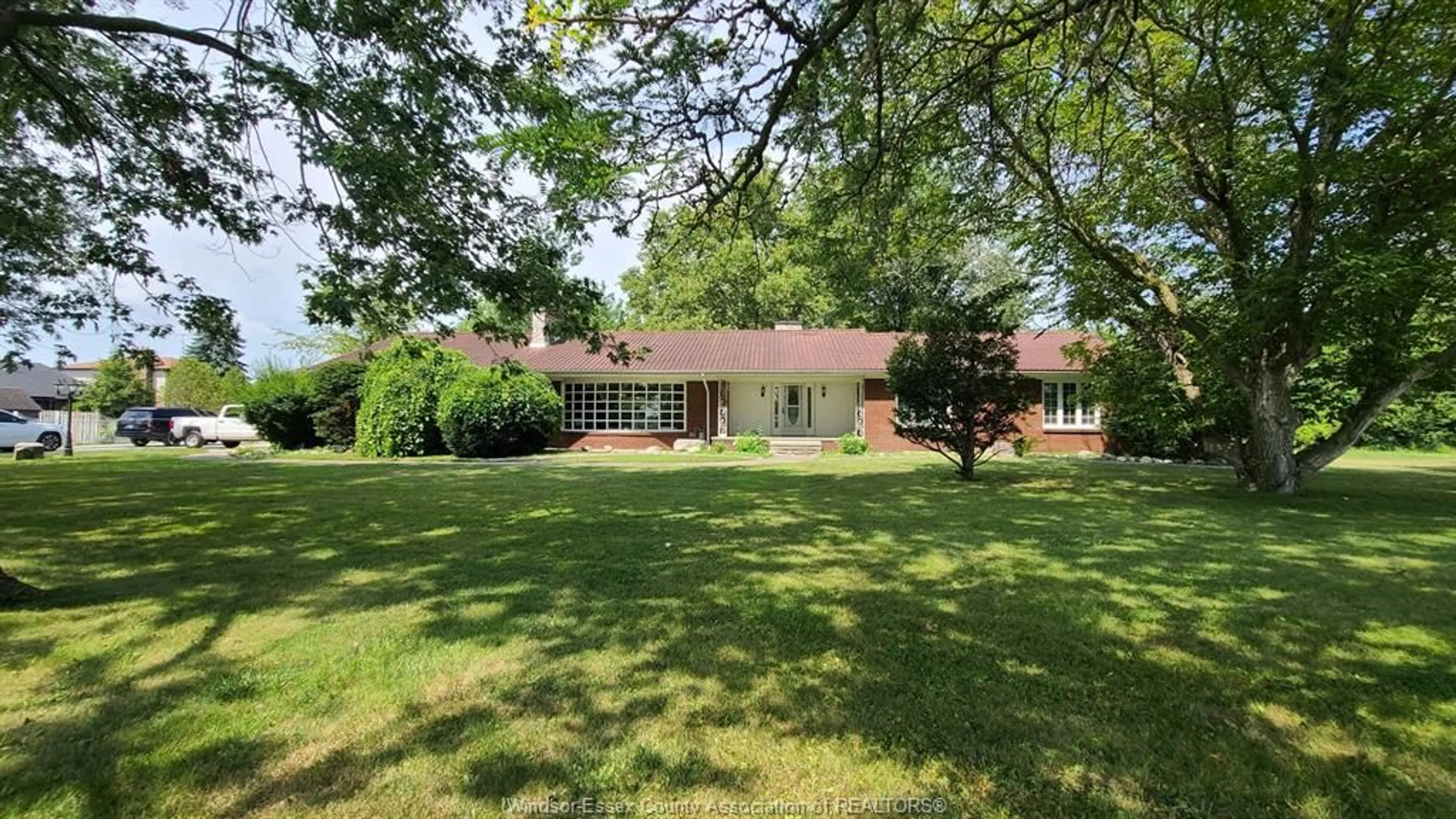 A pic from outside/outdoor area/front of a property/back of a property/a pic from drone, unknown for 299 GOSFIELD TOWNLINE, Essex Ontario N8M 2X5