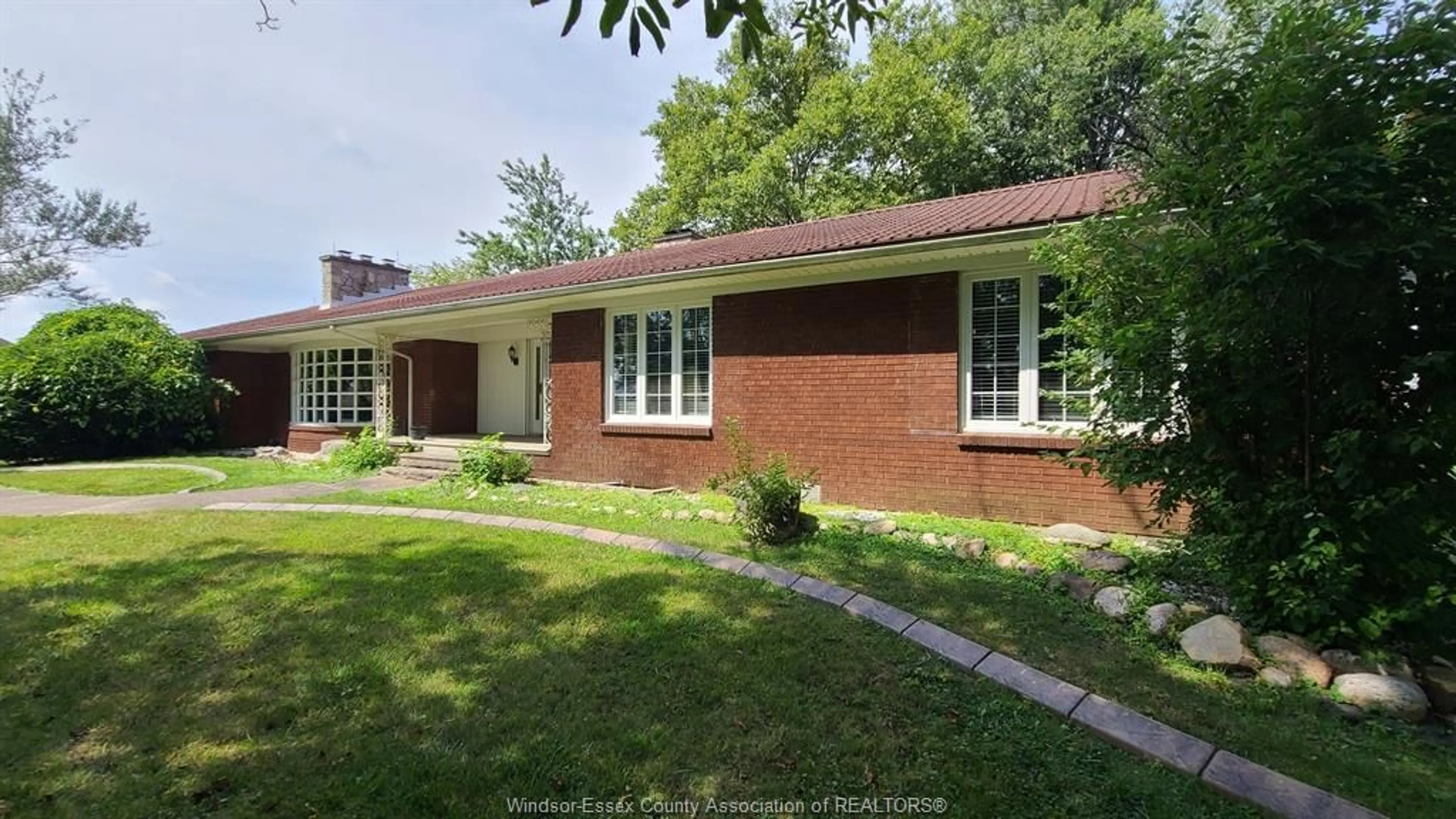 Home with brick exterior material, street for 299 GOSFIELD TOWNLINE, Essex Ontario N8M 2X5