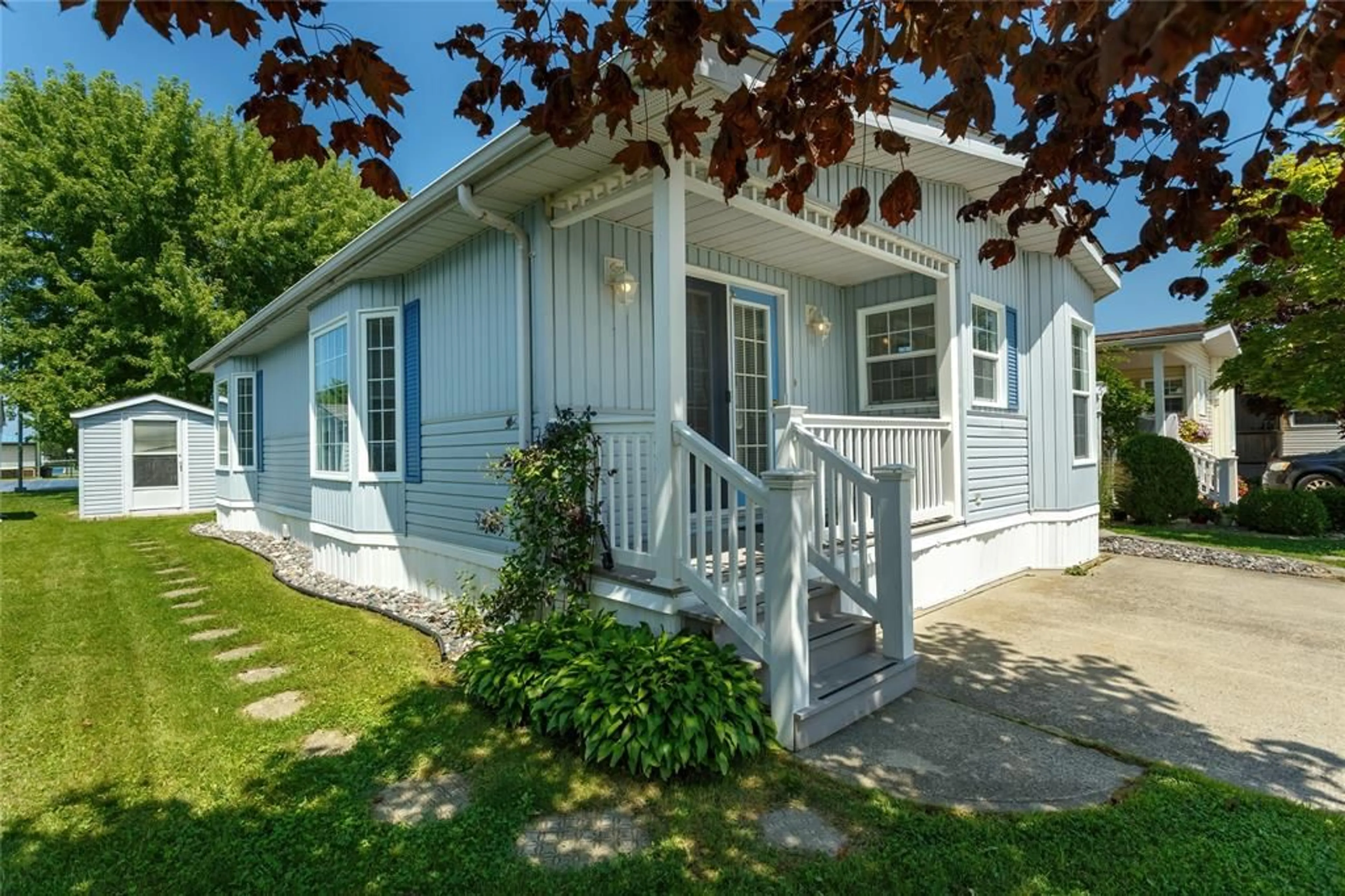 Home with vinyl exterior material, street for 5700 BLACKWELL Sideroad #294, Sarnia Ontario N7W 1B7