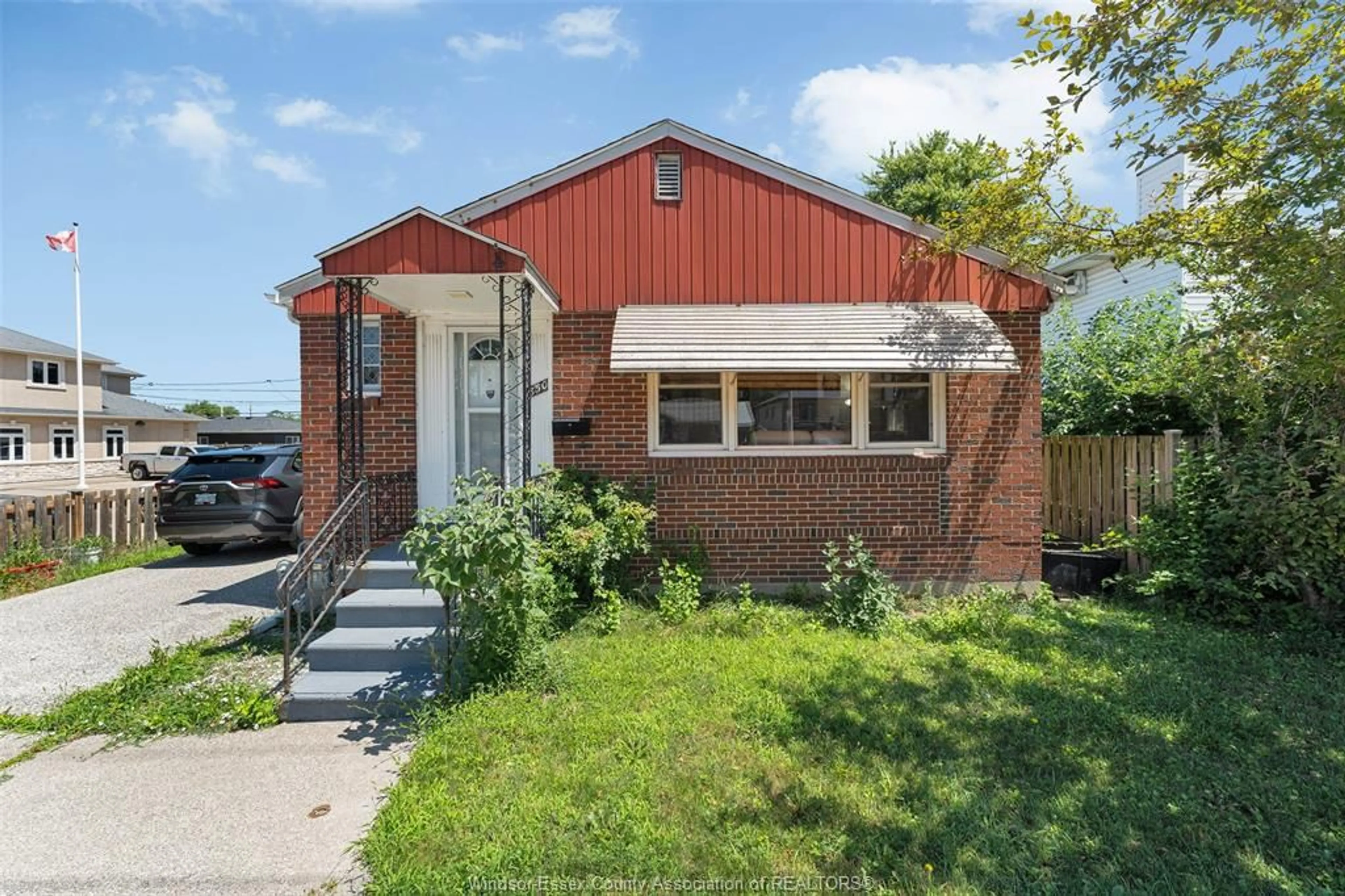 Home with brick exterior material, street for 850 LAUZON, Windsor Ontario N8S 3M5