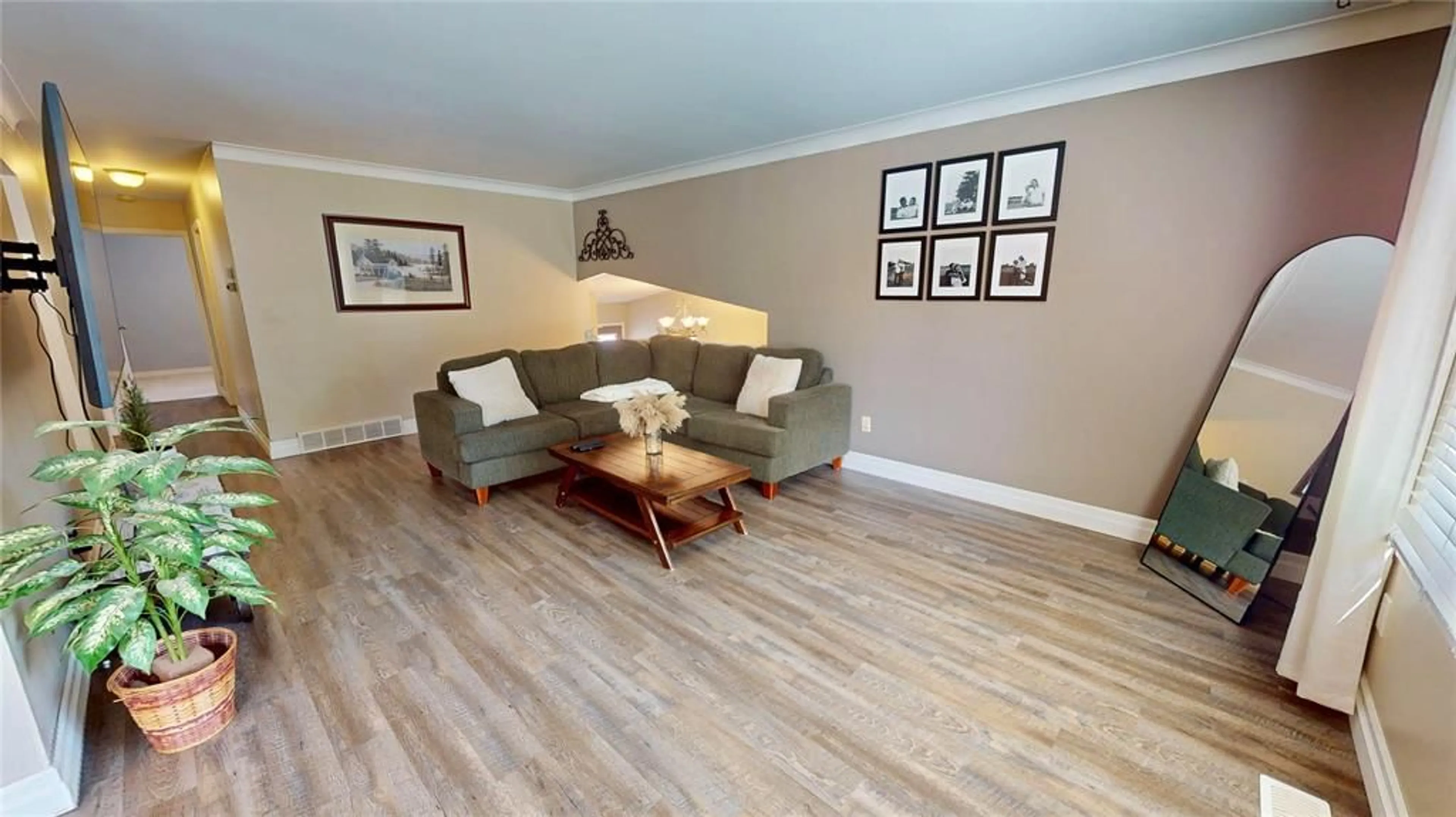 Living room with furniture, wood/laminate floor for 2412 JANE St, St Clair Ontario N0N 1B0