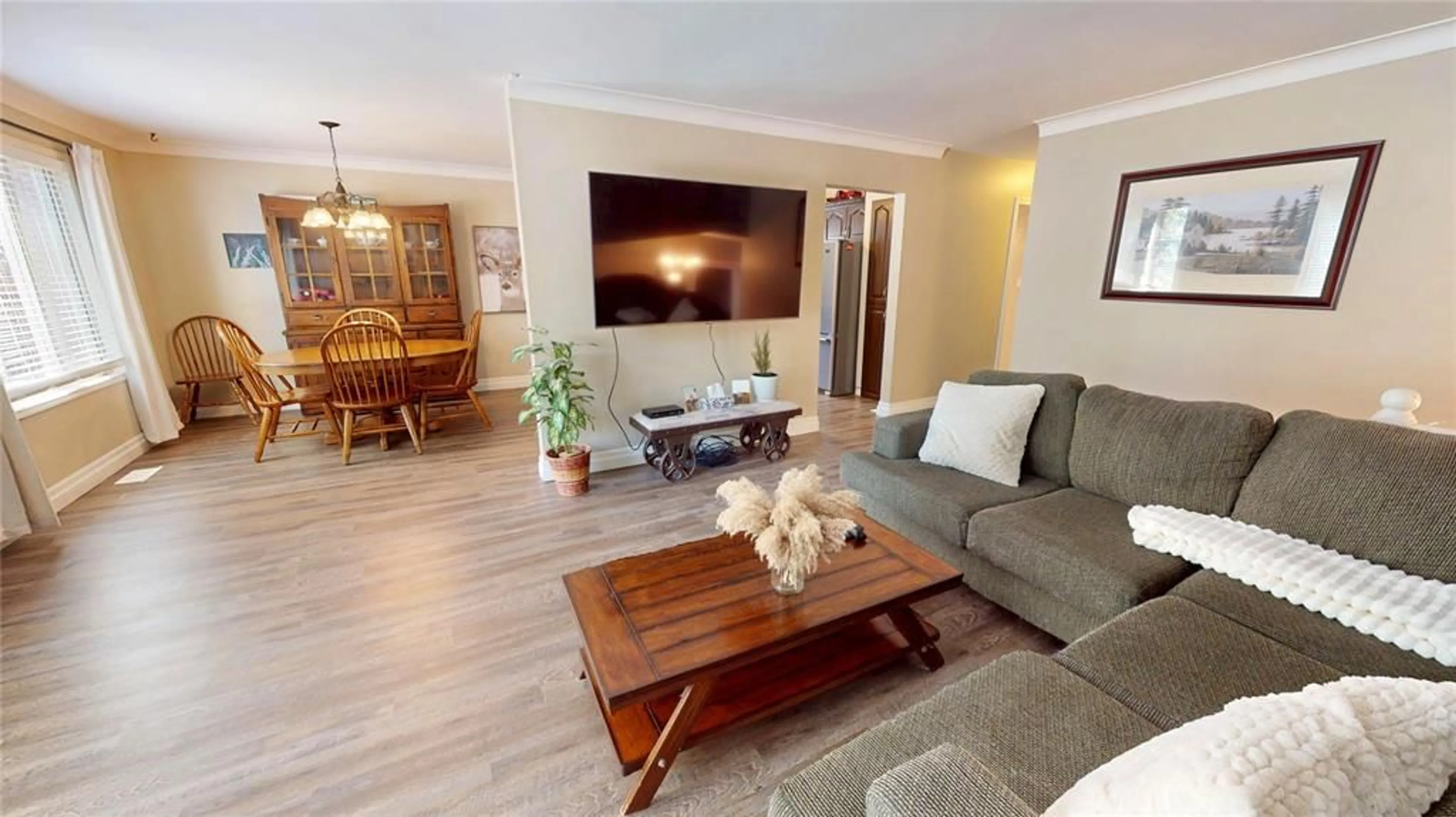 Living room with furniture, wood/laminate floor for 2412 JANE St, St Clair Ontario N0N 1B0