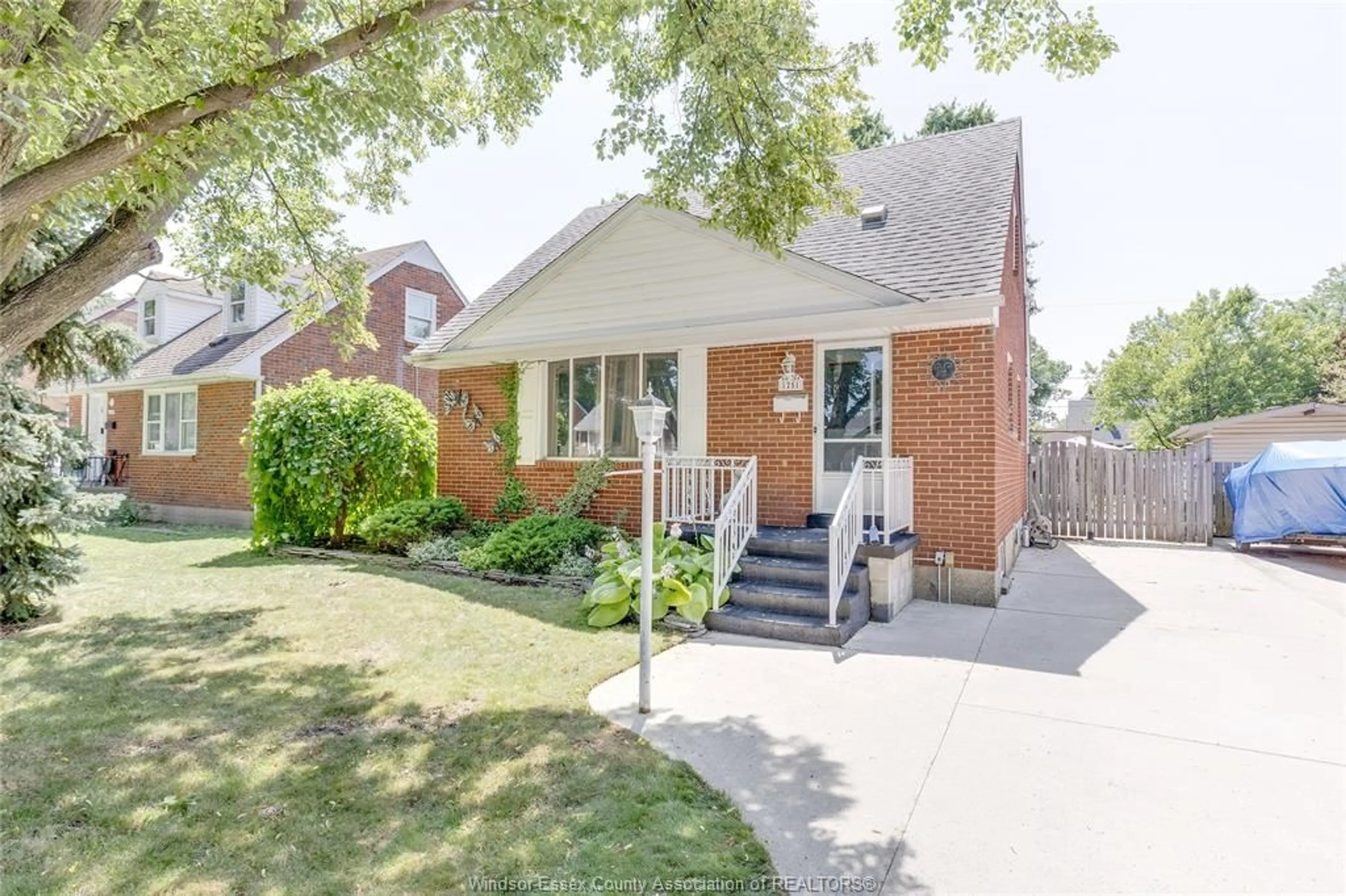 Home with brick exterior material, street for 1251 TILSTON, Windsor Ontario N9B 3C6