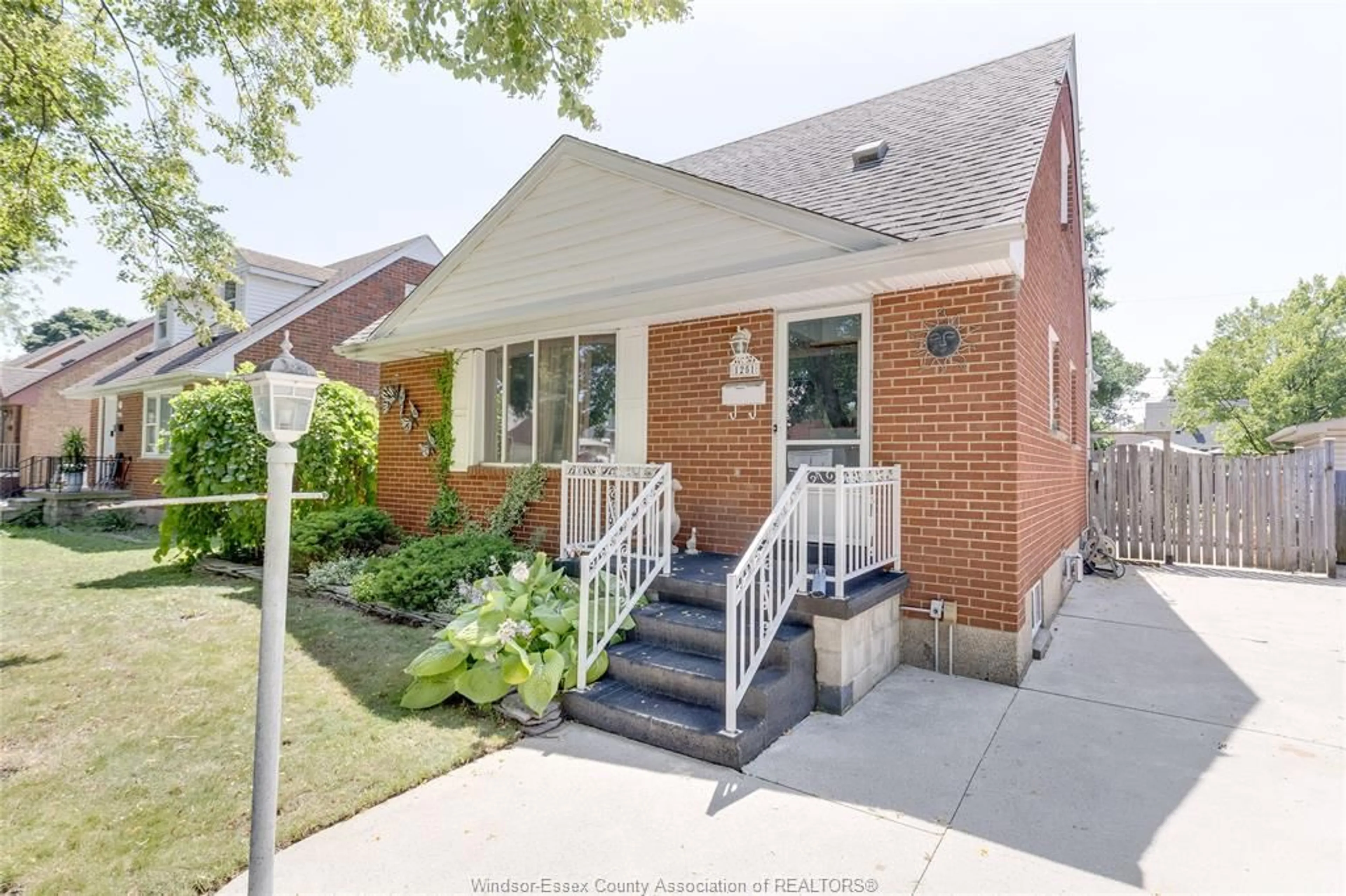 Home with brick exterior material, street for 1251 TILSTON, Windsor Ontario N9B 3C6