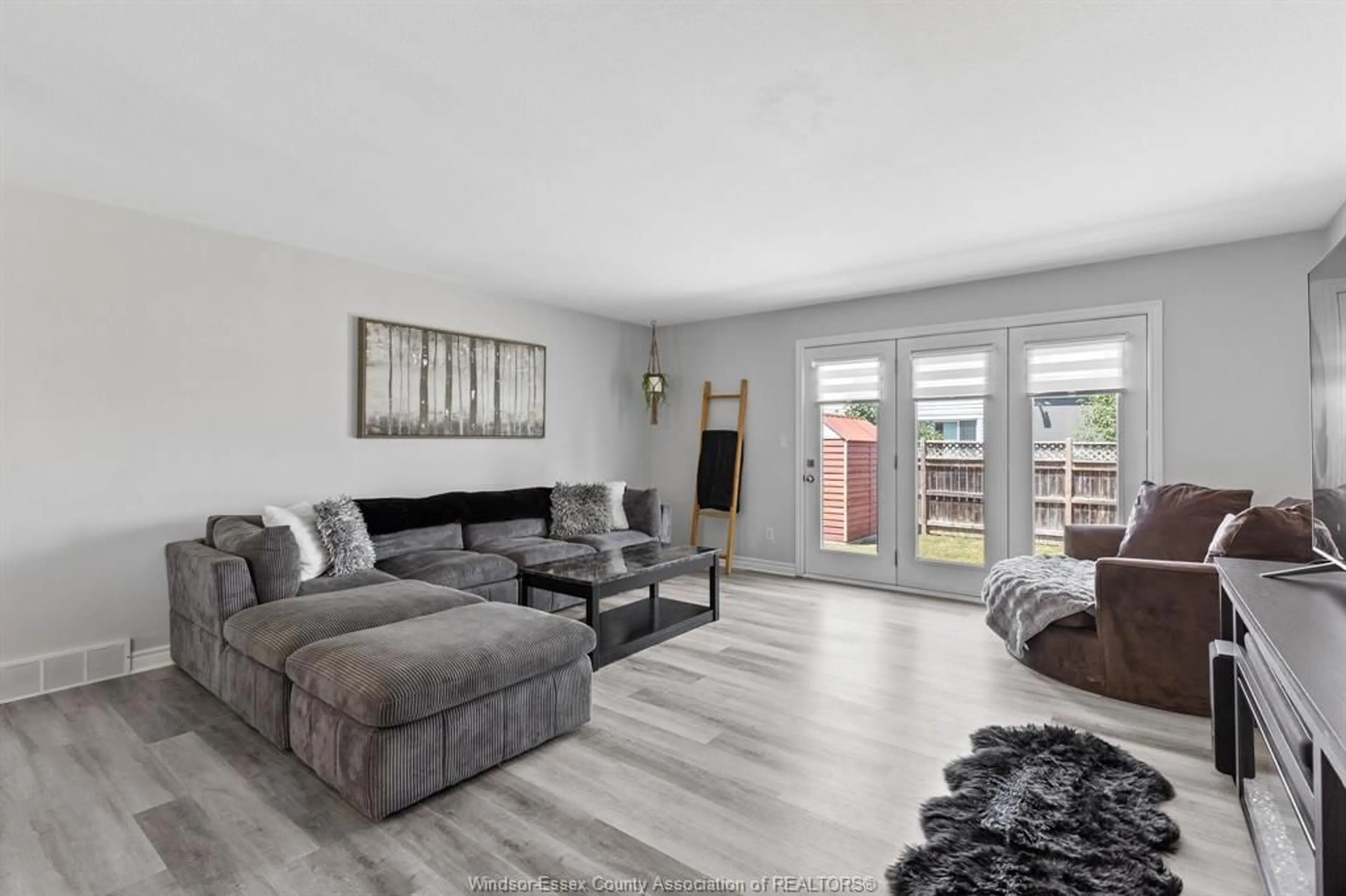 Living room with furniture, wood/laminate floor for 2B CRAWFORD Ave #B, Tilbury Ontario N0P 2L0