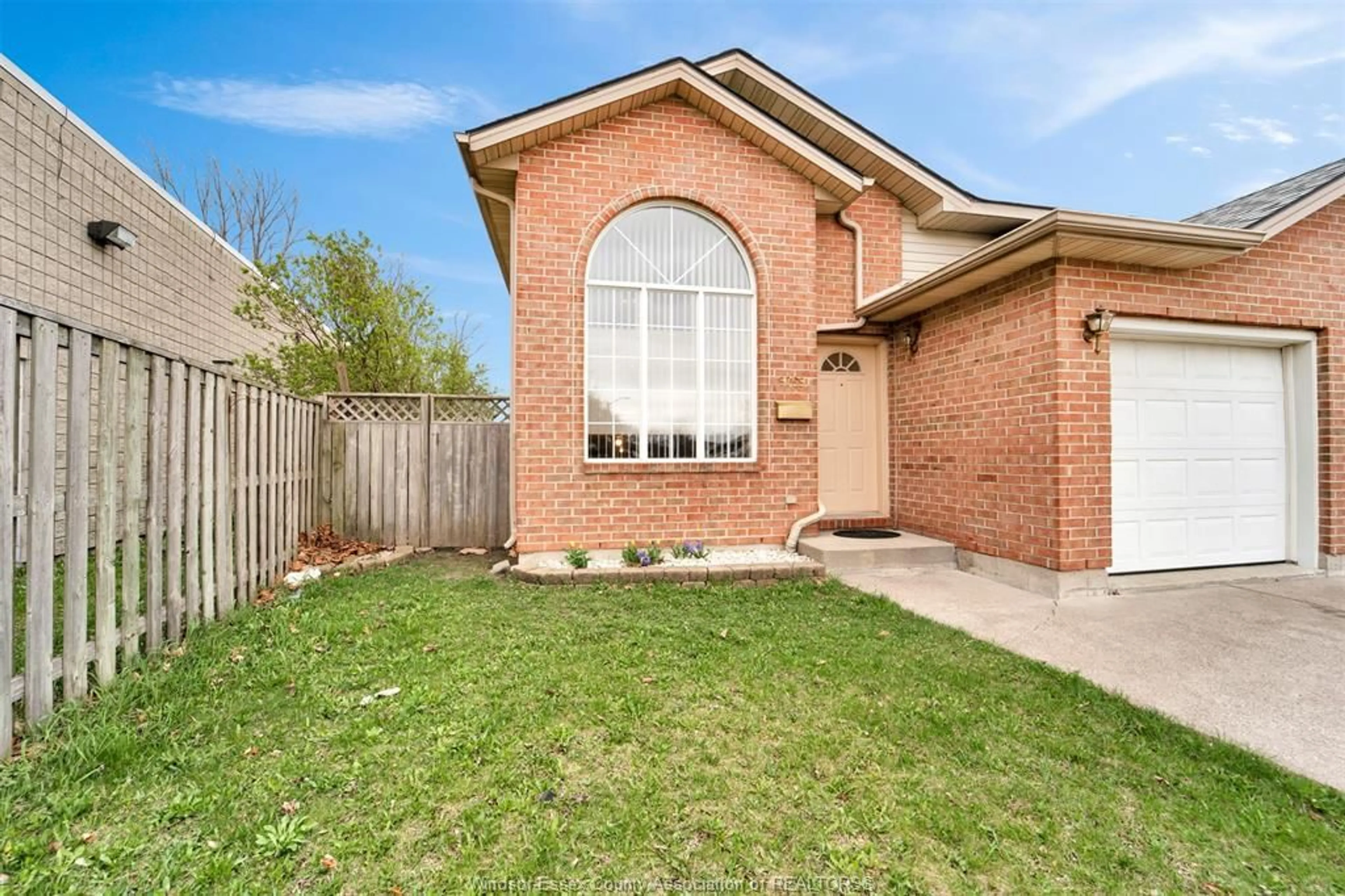 Home with brick exterior material, street for 9759 MELVILLE Cres, Windsor Ontario N8R 1B4