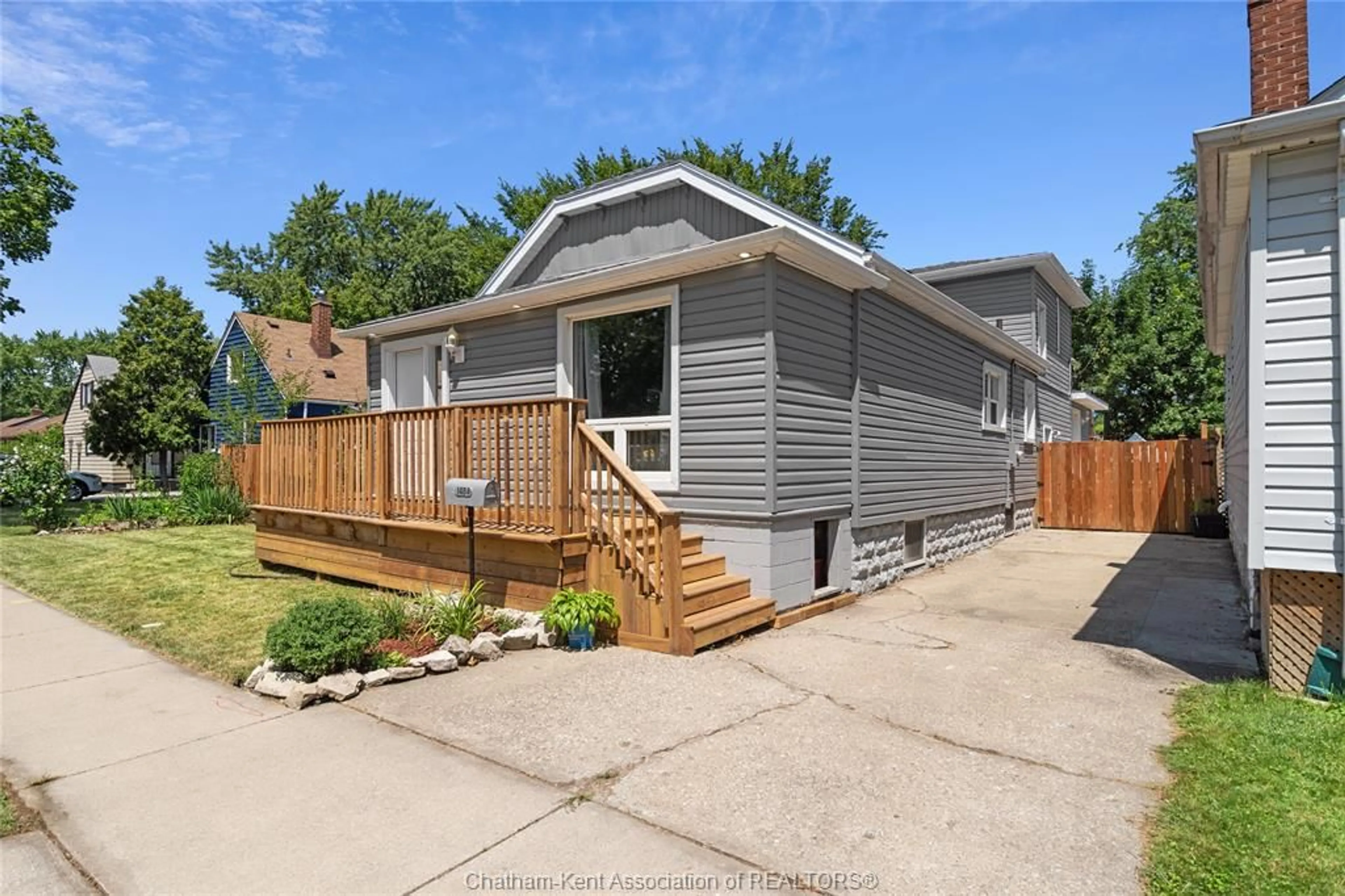 Home with vinyl exterior material, street for 1484 Tourangeau Rd, Windsor Ontario N8Y 4J2