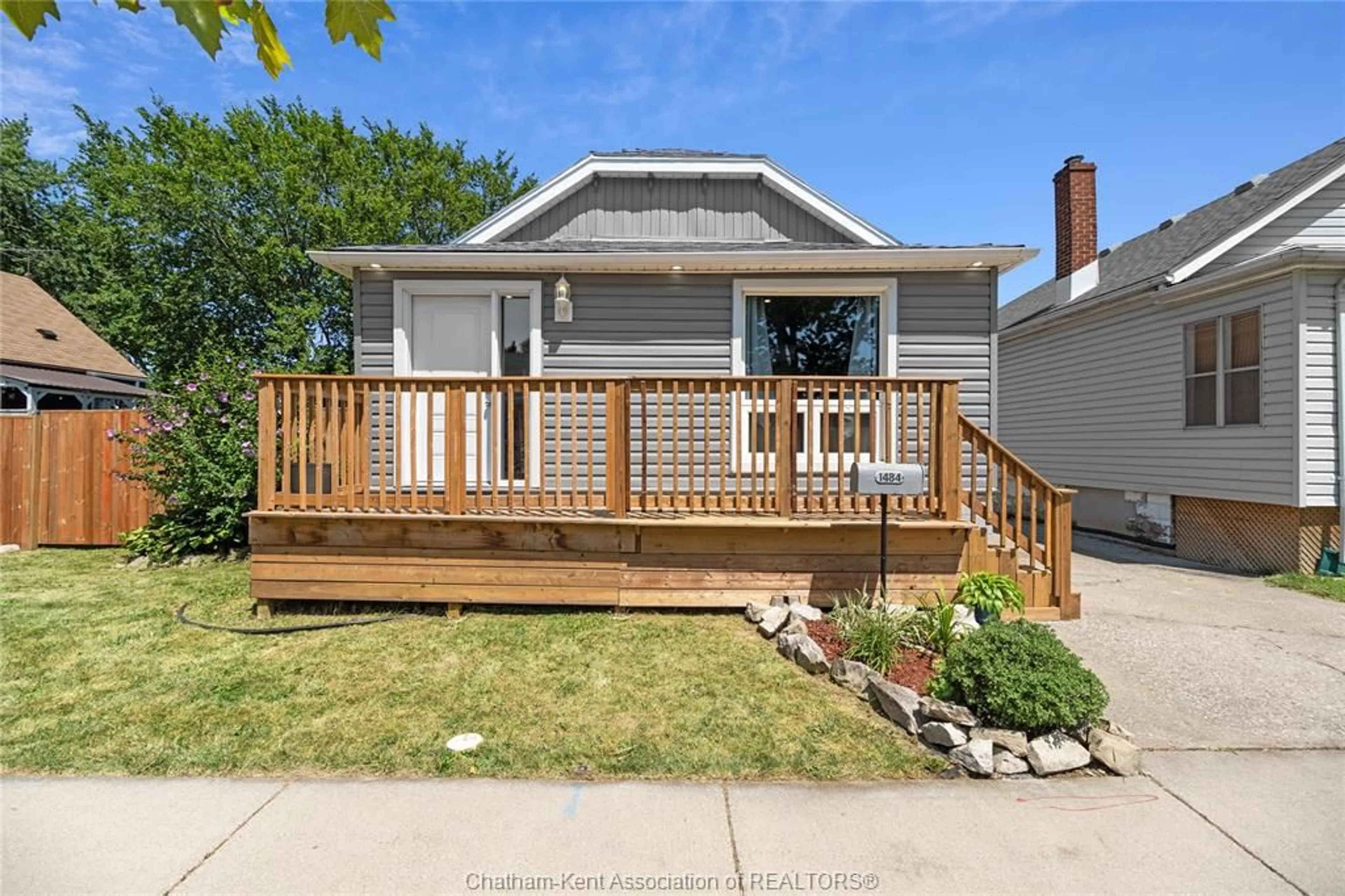 Home with vinyl exterior material, street for 1484 Tourangeau Rd, Windsor Ontario N8Y 4J2