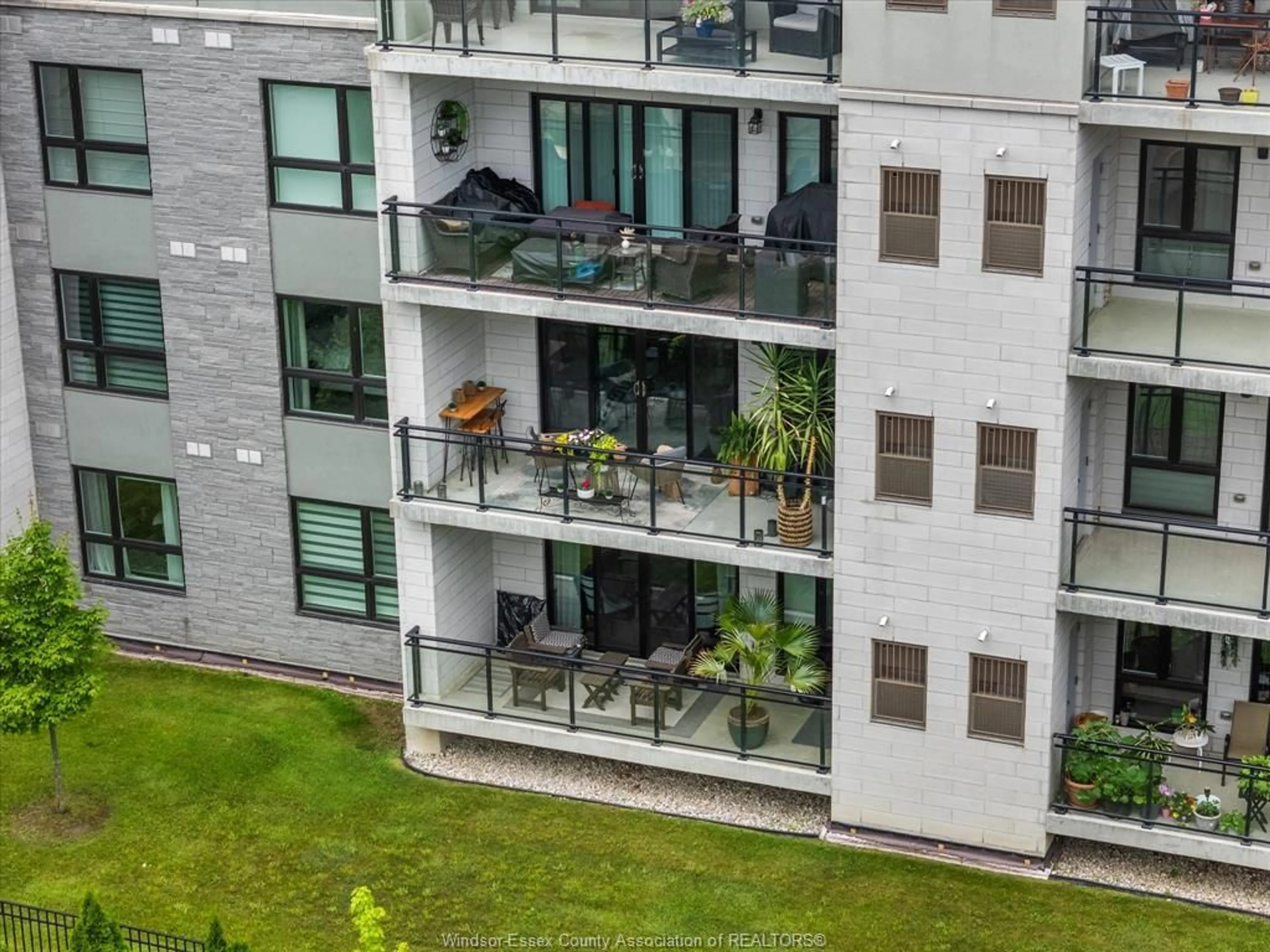 A pic from outside/outdoor area/front of a property/back of a property/a pic from drone, city buildings view from balcony for 250 Manning Rd #204, Tecumseh Ontario N8H 0A8