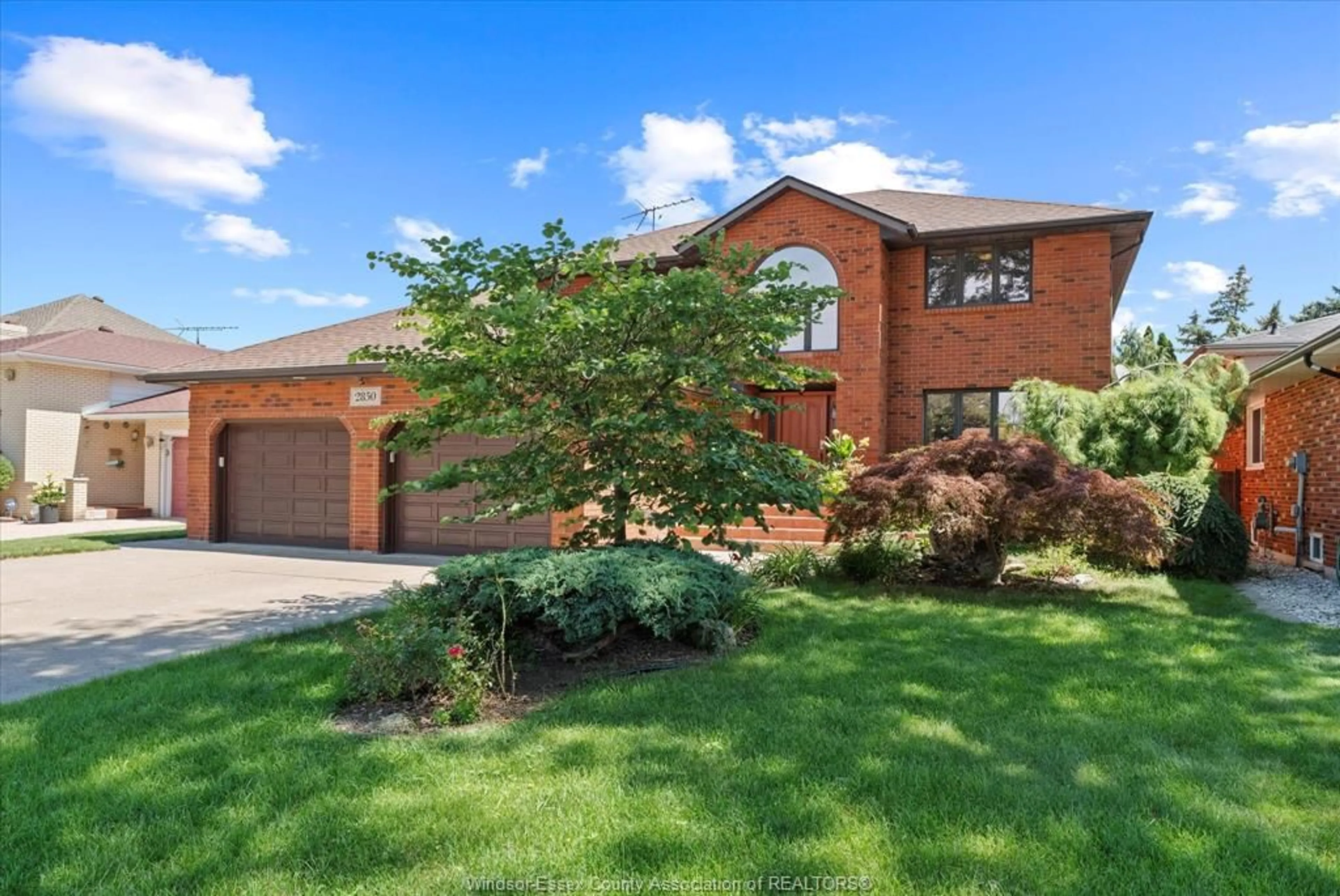 Home with brick exterior material, street for 2850 St. Clair Ave, Windsor Ontario N9E 4B4