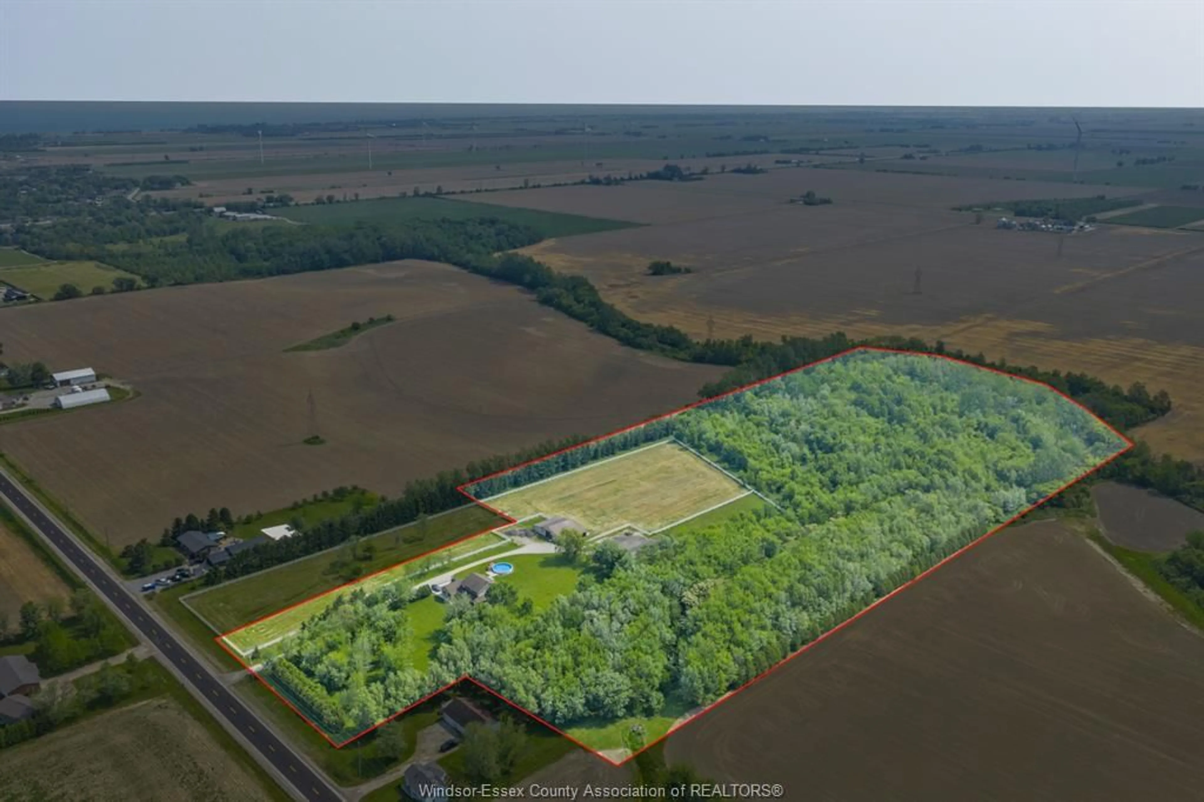 A pic from outside/outdoor area/front of a property/back of a property/a pic from drone, forest/trees view for 1418 COUNTY RD 31, Lakeshore Ontario N0R 1S0