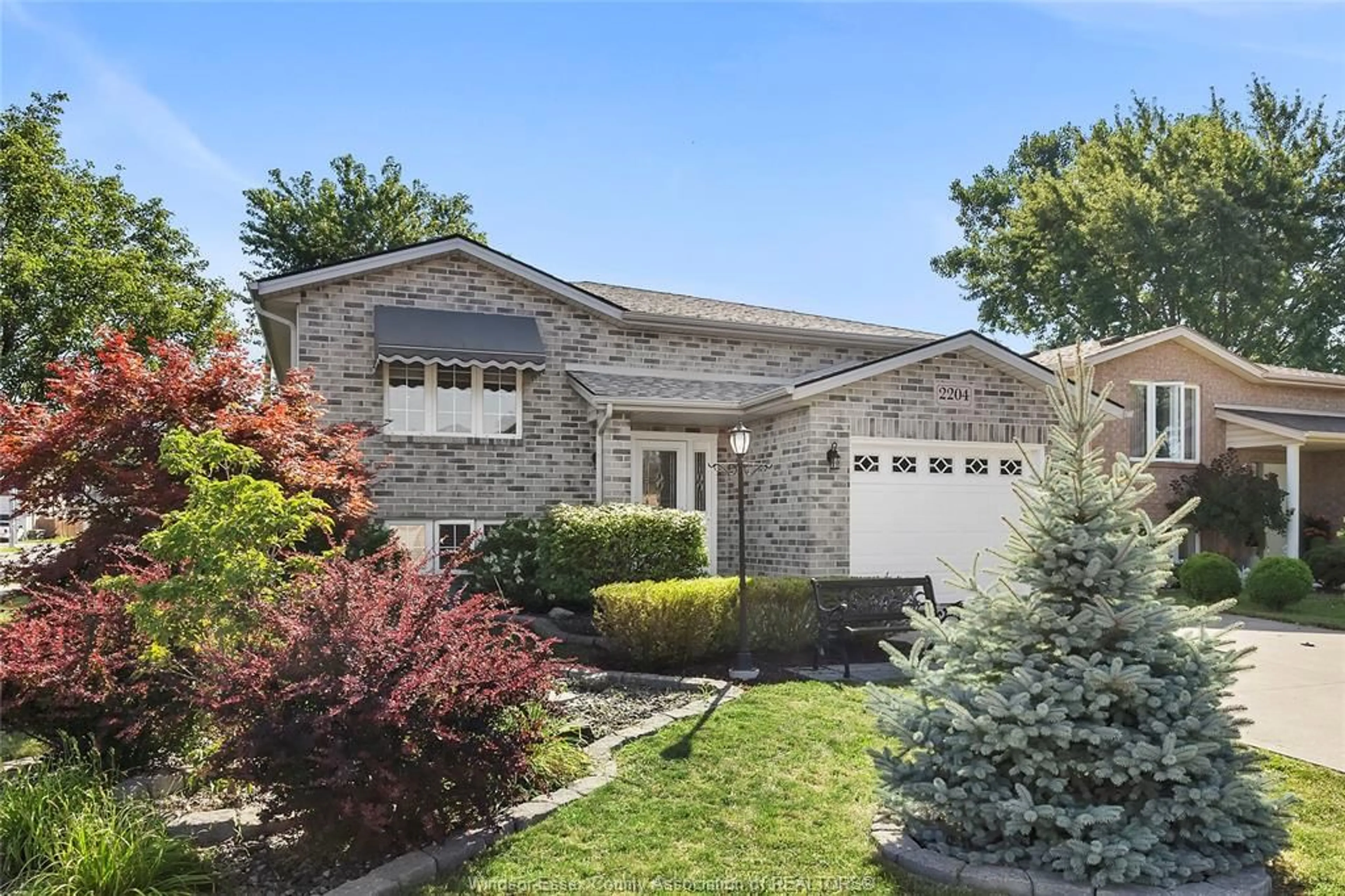 Home with brick exterior material, street for 2204 MCKAY Ave, Windsor Ontario N9B 3W9