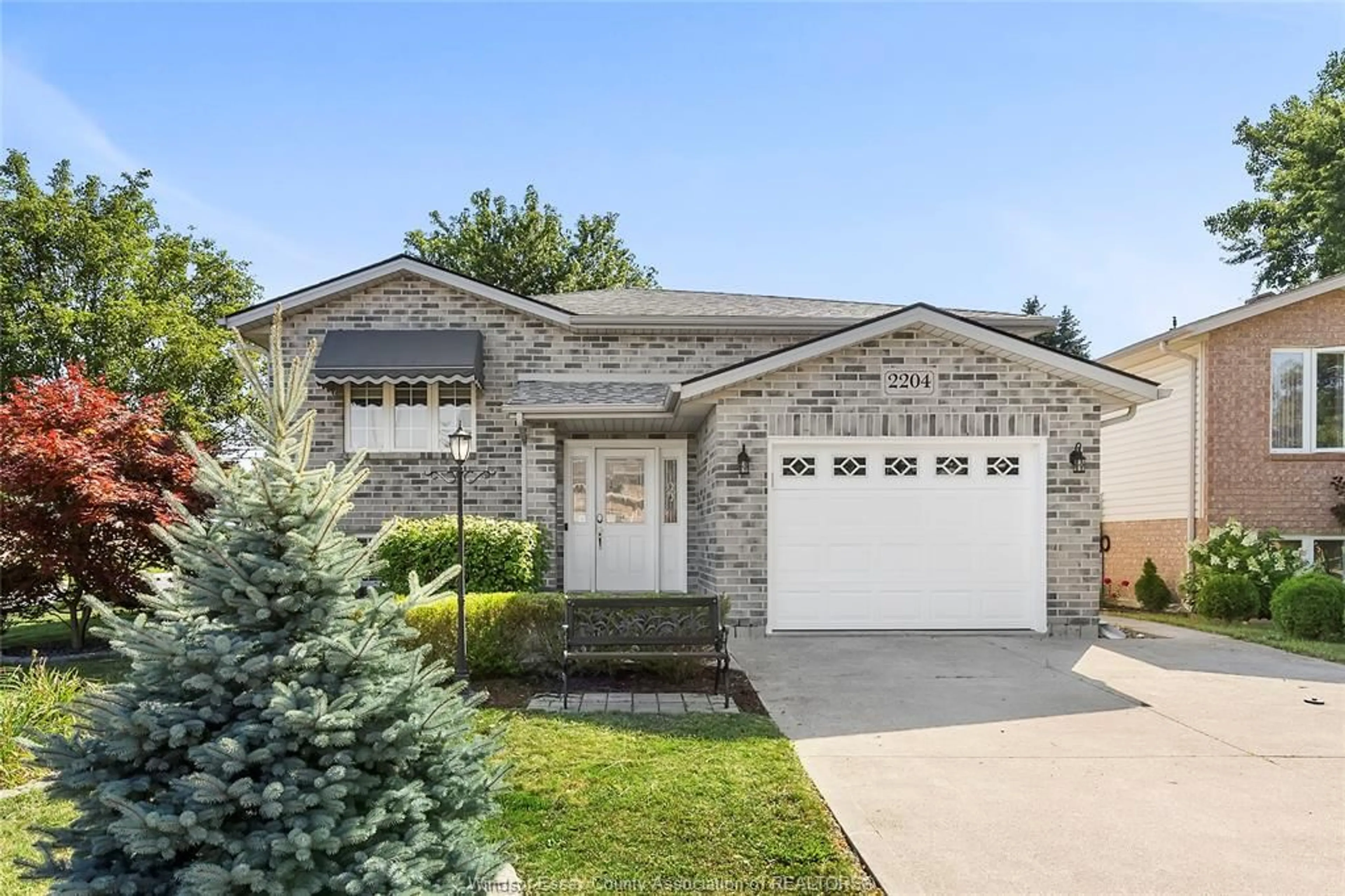 Home with brick exterior material, street for 2204 MCKAY Ave, Windsor Ontario N9B 3W9