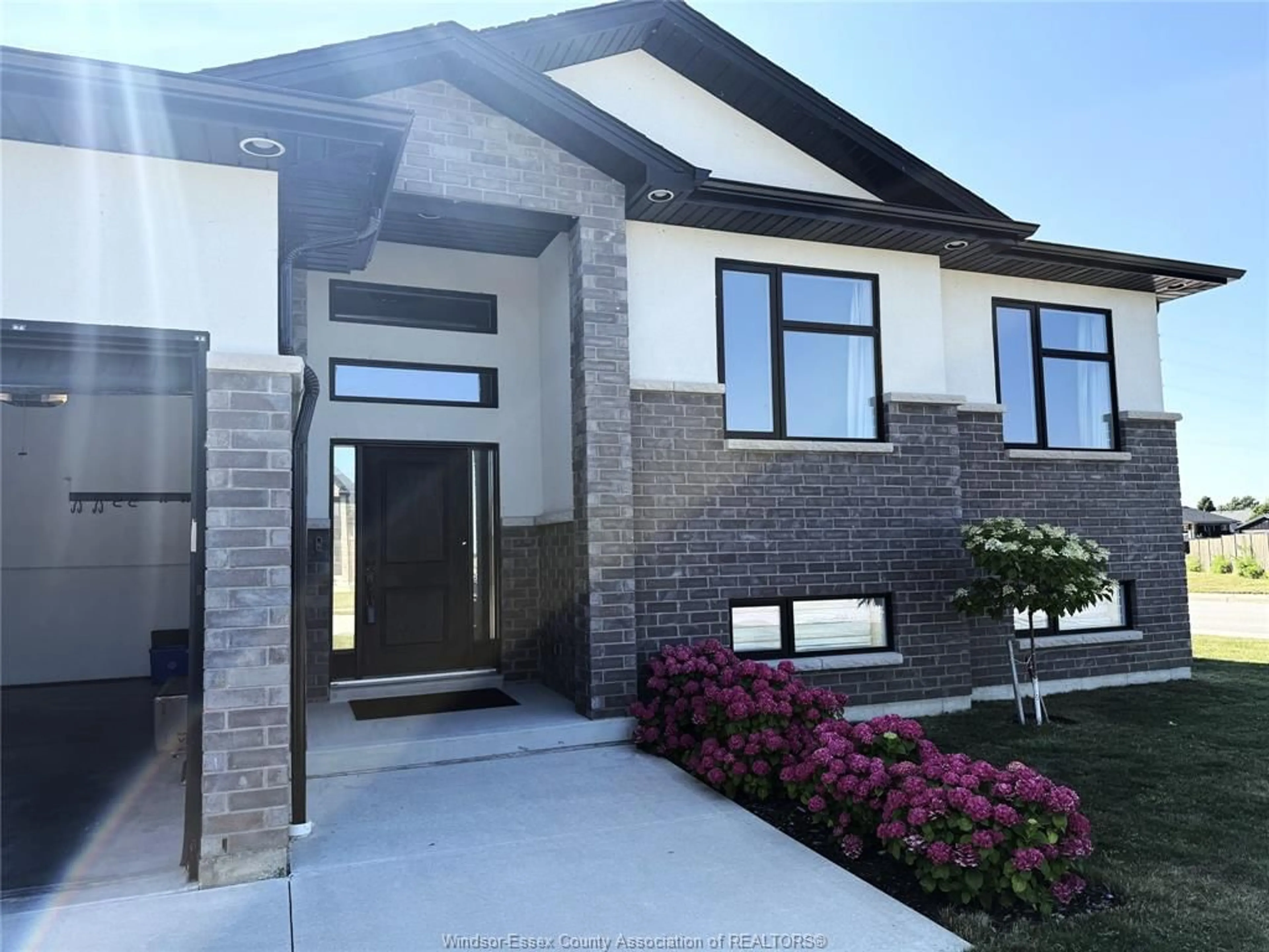 Home with brick exterior material, street for 33 SUNNINGDALE Dr, Leamington Ontario N8H 0C4