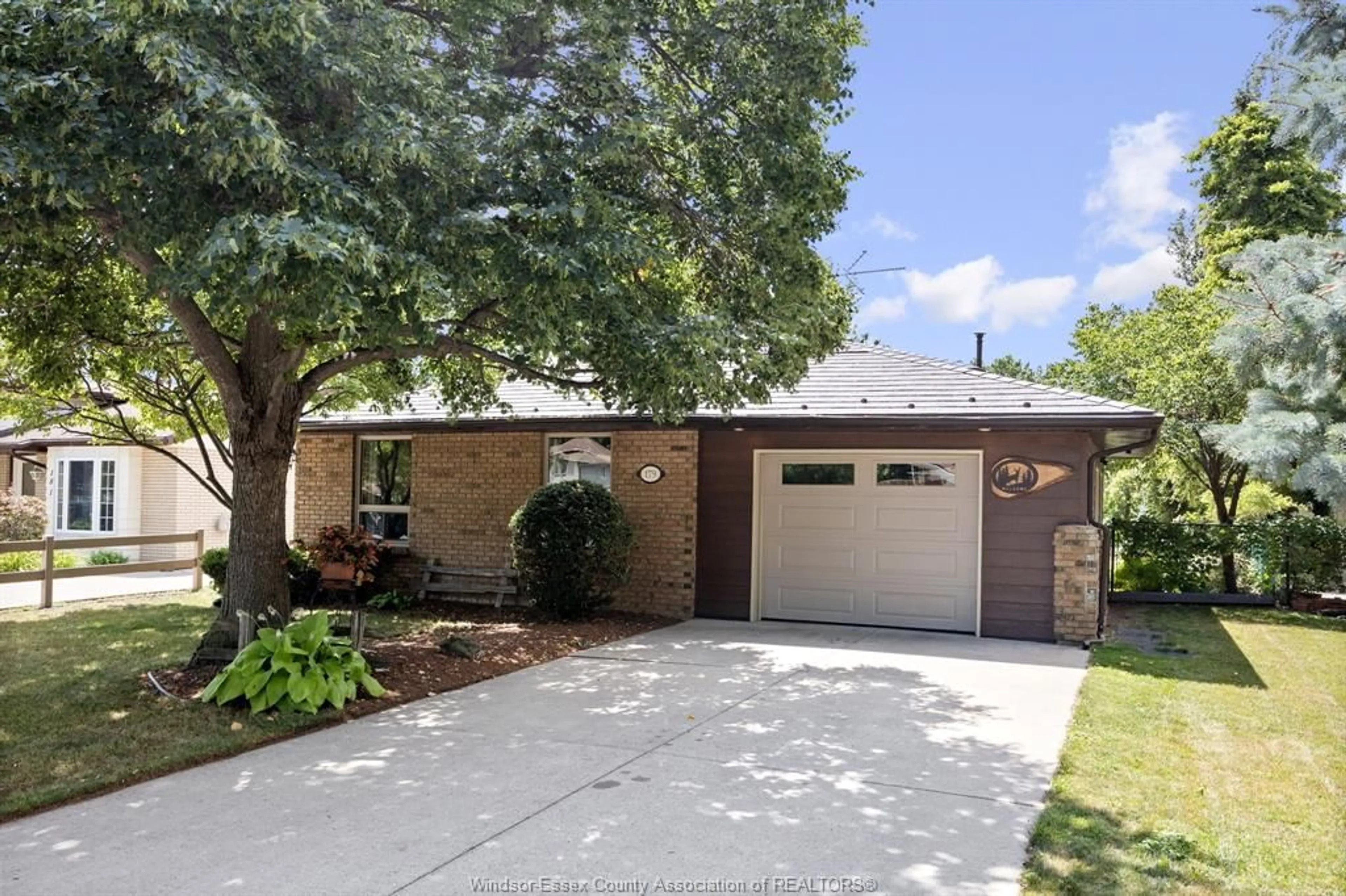 Home with brick exterior material, street for 179 ROYAL Cres, Lakeshore Ontario N0R 1A0