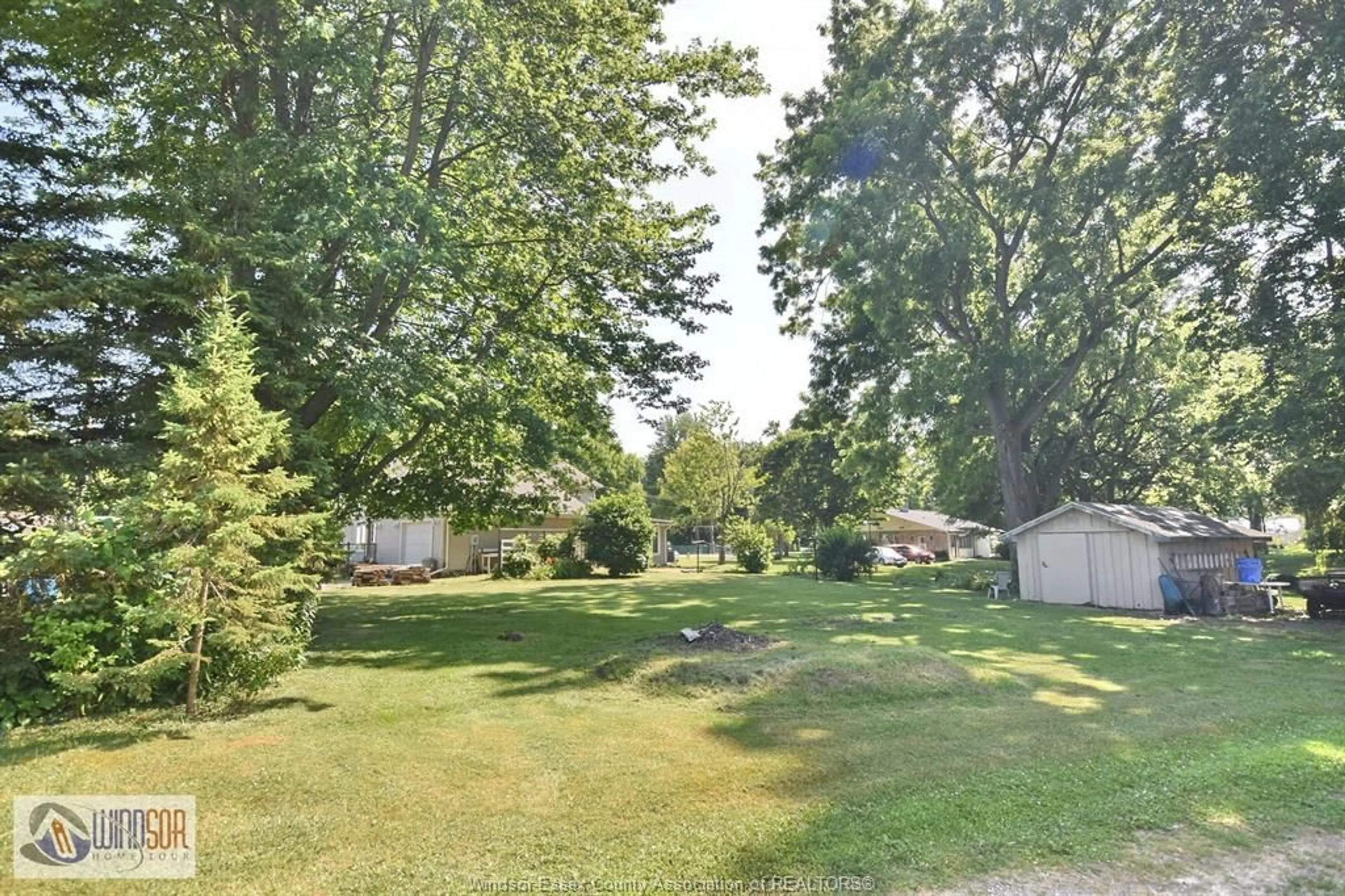 A pic from outside/outdoor area/front of a property/back of a property/a pic from drone, forest/trees view for 474 COUNTY RD 50, Harrow Ontario N0R 1G0