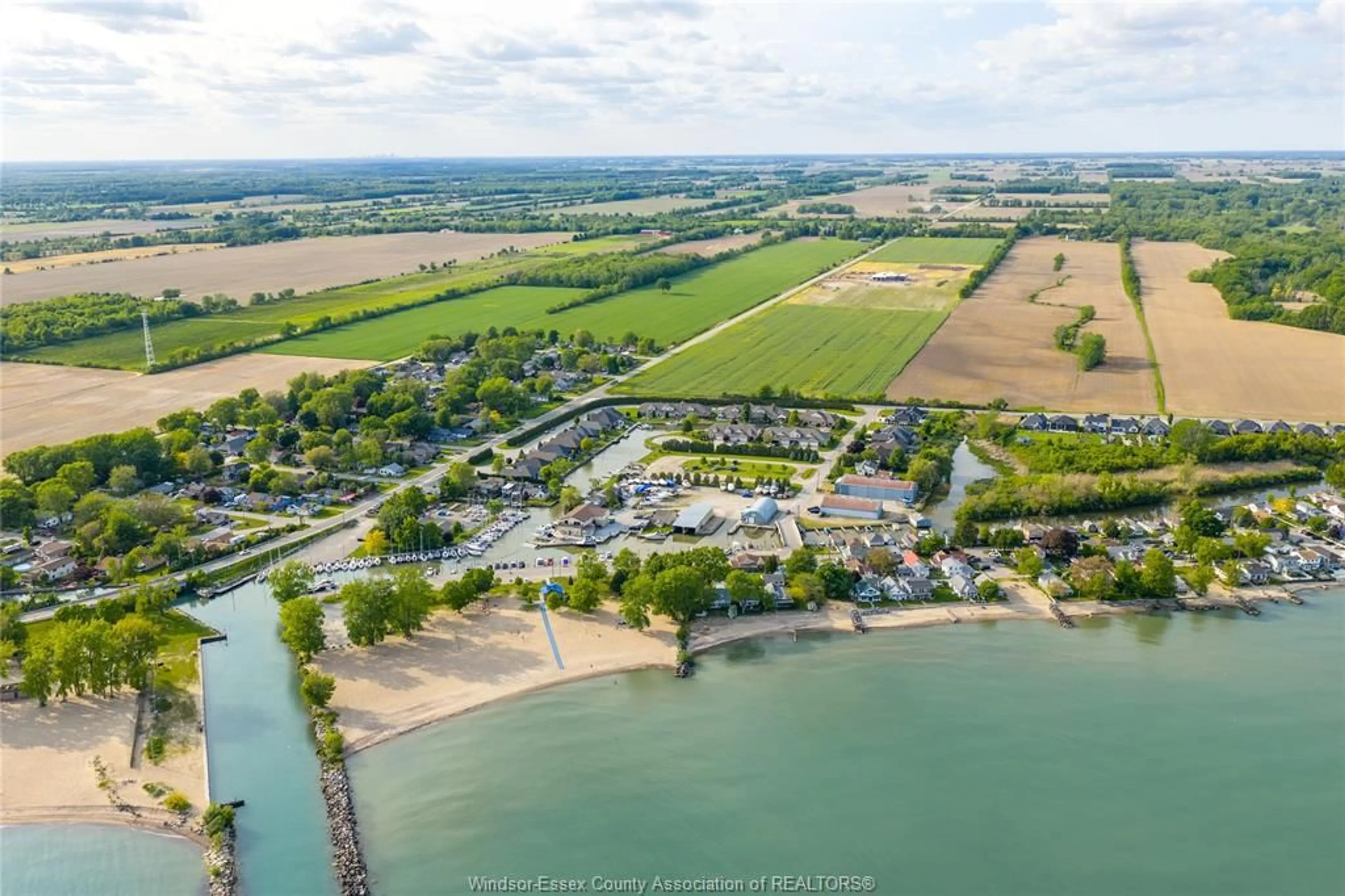 A pic from outside/outdoor area/front of a property/back of a property/a pic from drone, water/lake/river/ocean view for 33 Montego Bay Cres, Kingsville Ontario N9Y 4E7